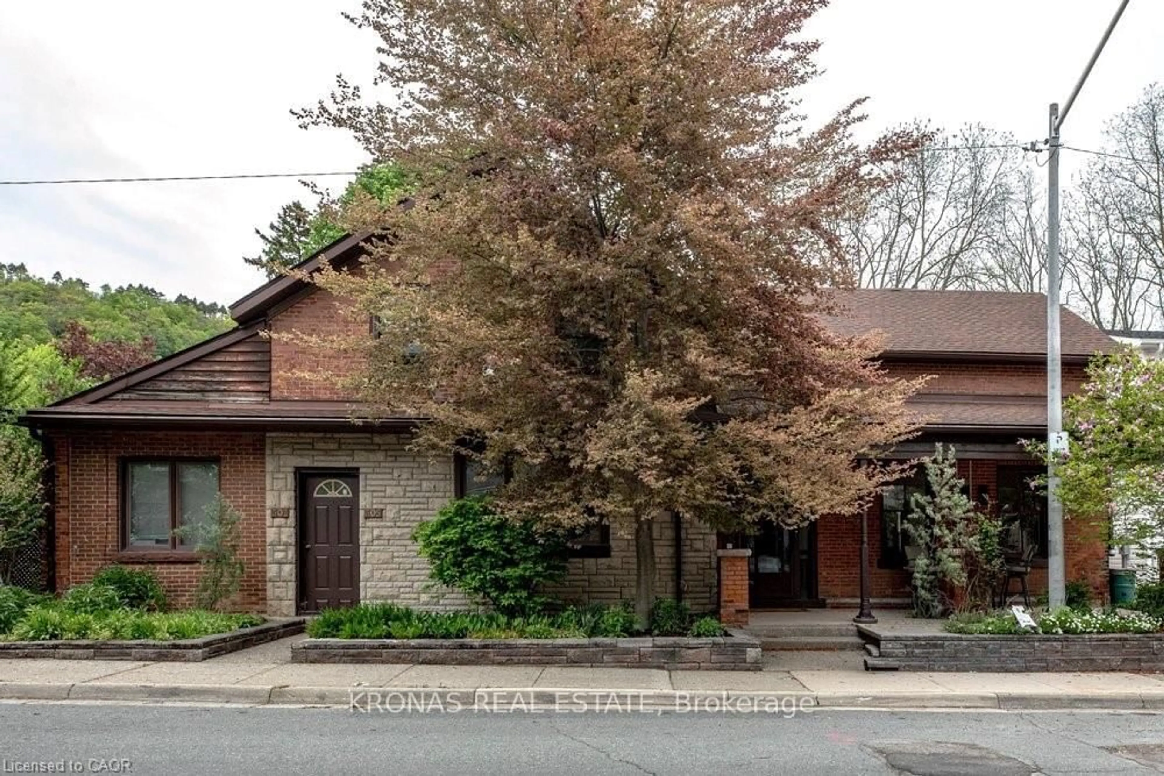 Home with brick exterior material, street for 307 King St, Hamilton Ontario L9H 1W3