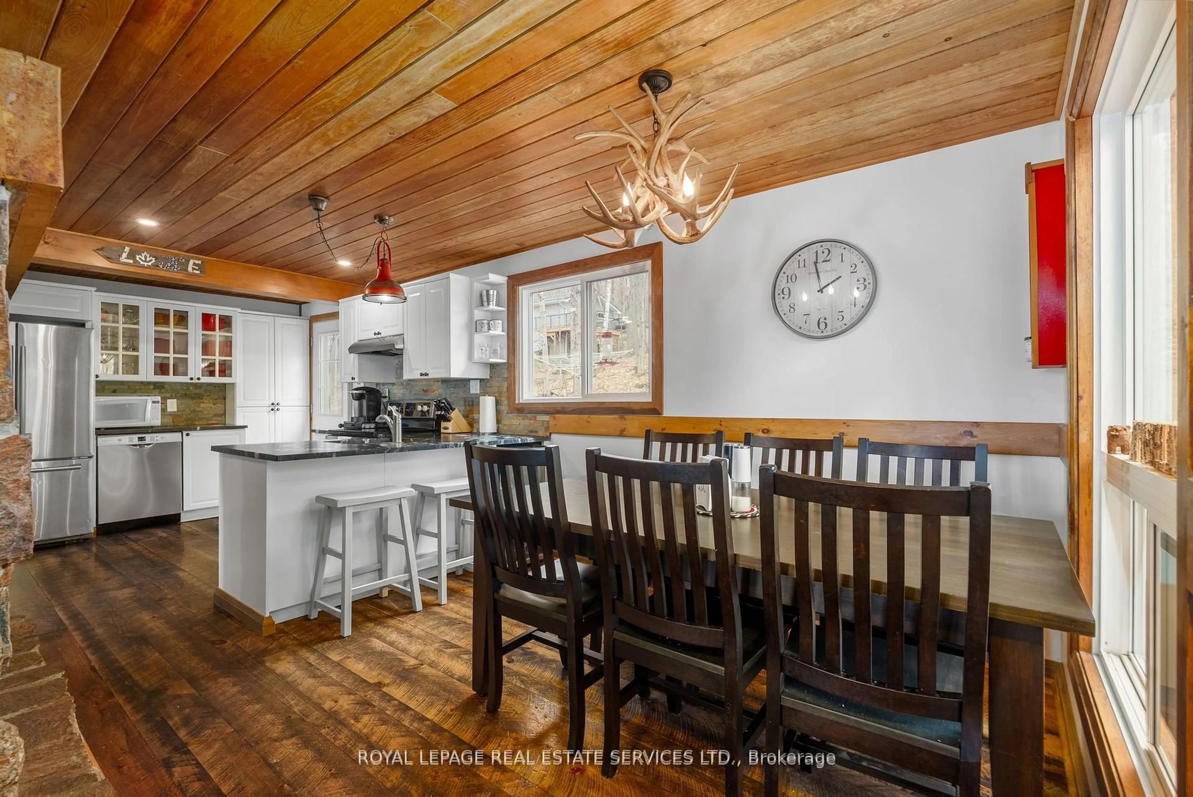 Open concept kitchen, wood/laminate floor for 1158 Shea Rd #29, Muskoka Lakes Ontario P0B 1M0