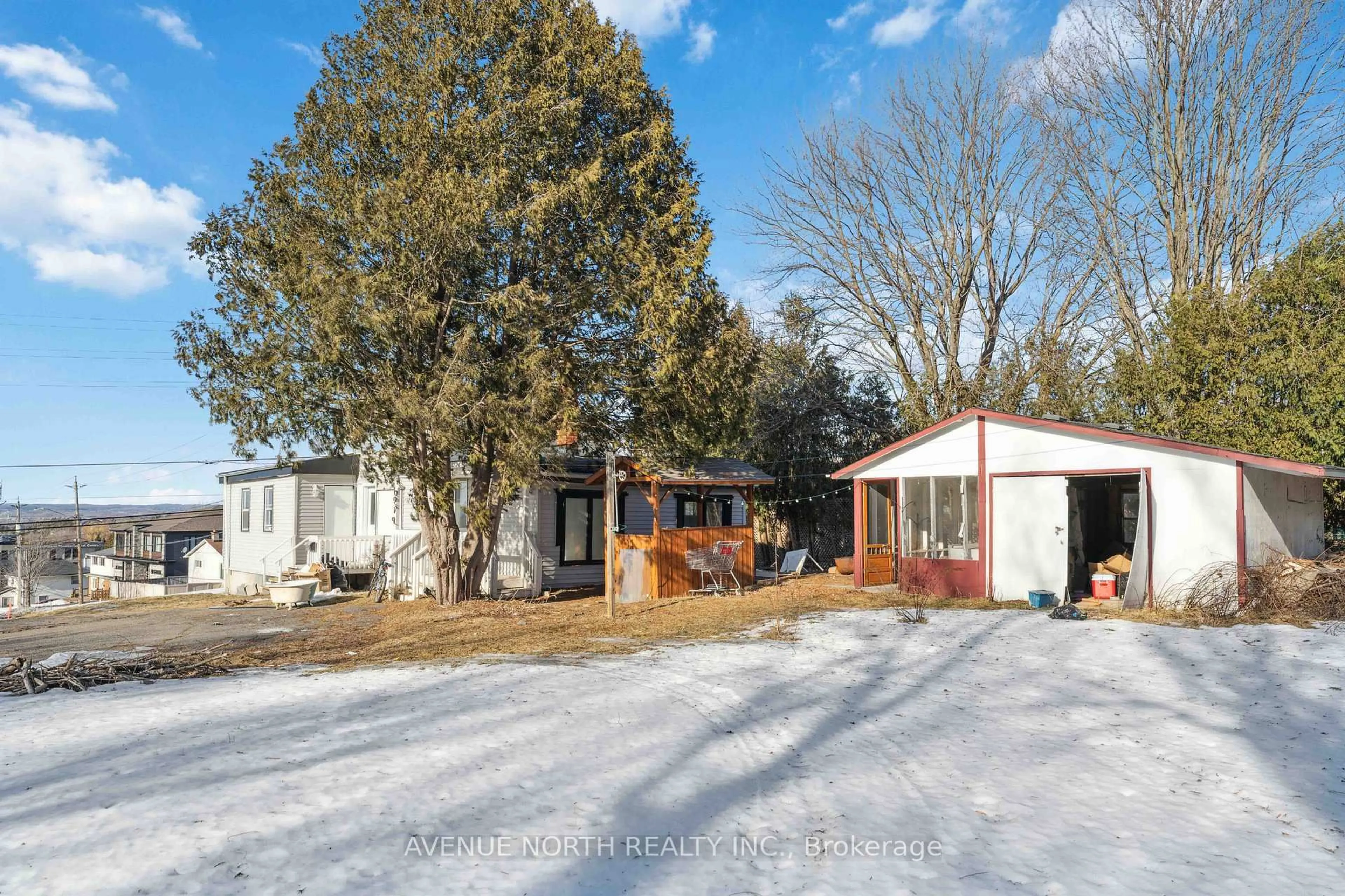 A pic from outside/outdoor area/front of a property/back of a property/a pic from drone, street for 6958 Notre Dame St, Ottawa Ontario K1C 1H7