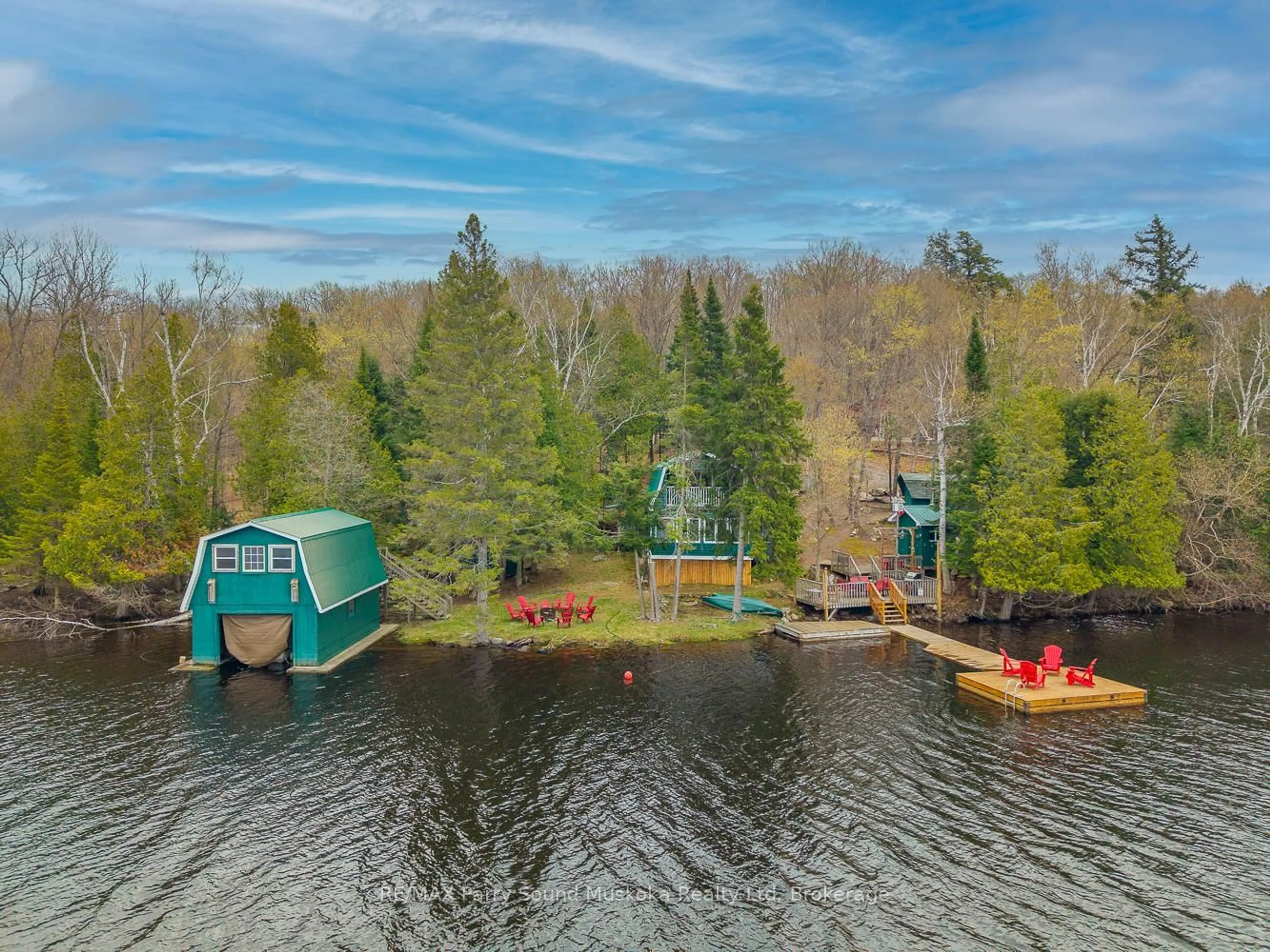 A pic from outside/outdoor area/front of a property/back of a property/a pic from drone, water/lake/river/ocean view for 179 Woodland Lane, Magnetawan Ontario P0A 1P0