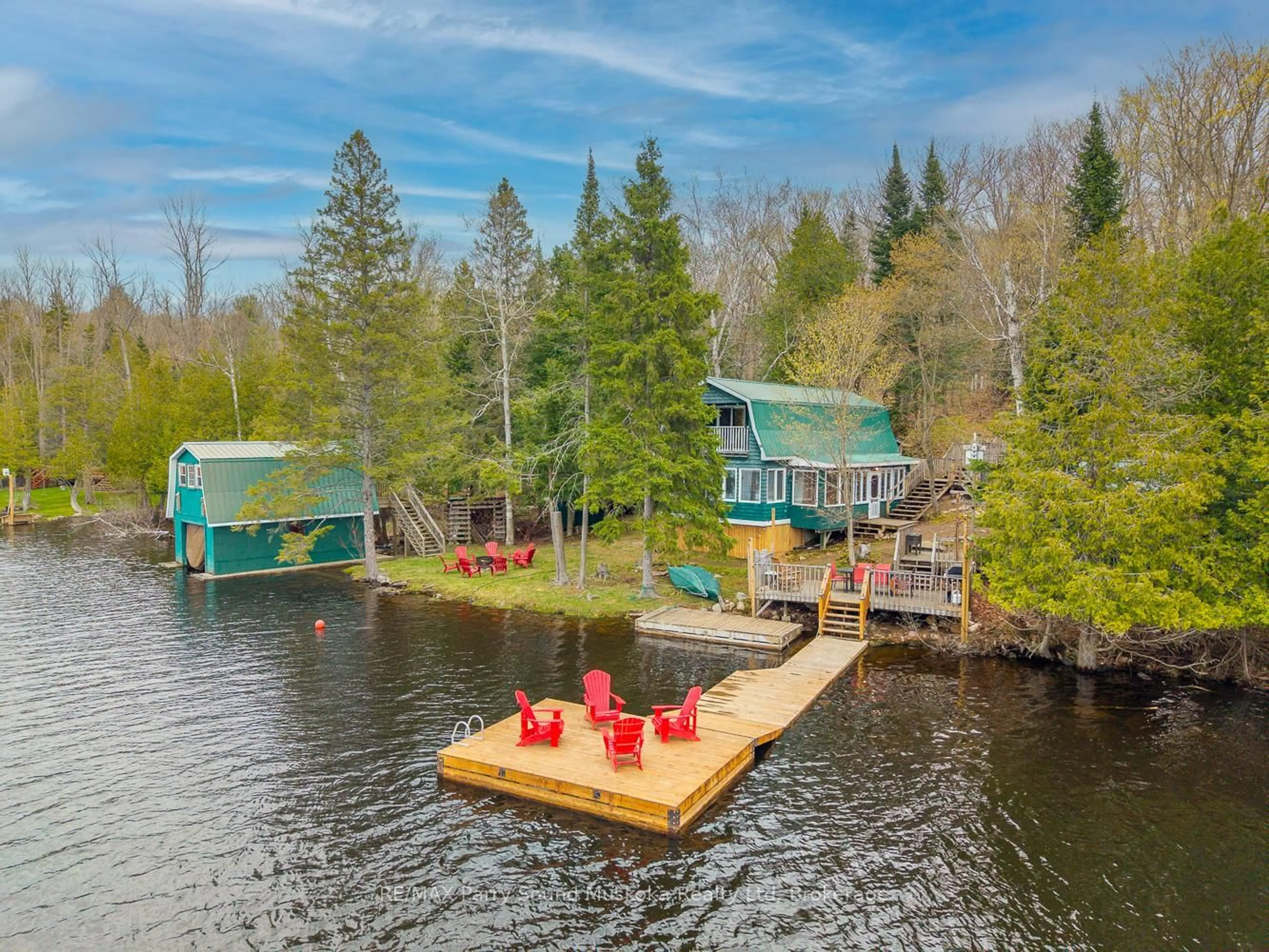 A pic from outside/outdoor area/front of a property/back of a property/a pic from drone, water/lake/river/ocean view for 179 Woodland Lane, Magnetawan Ontario P0A 1P0