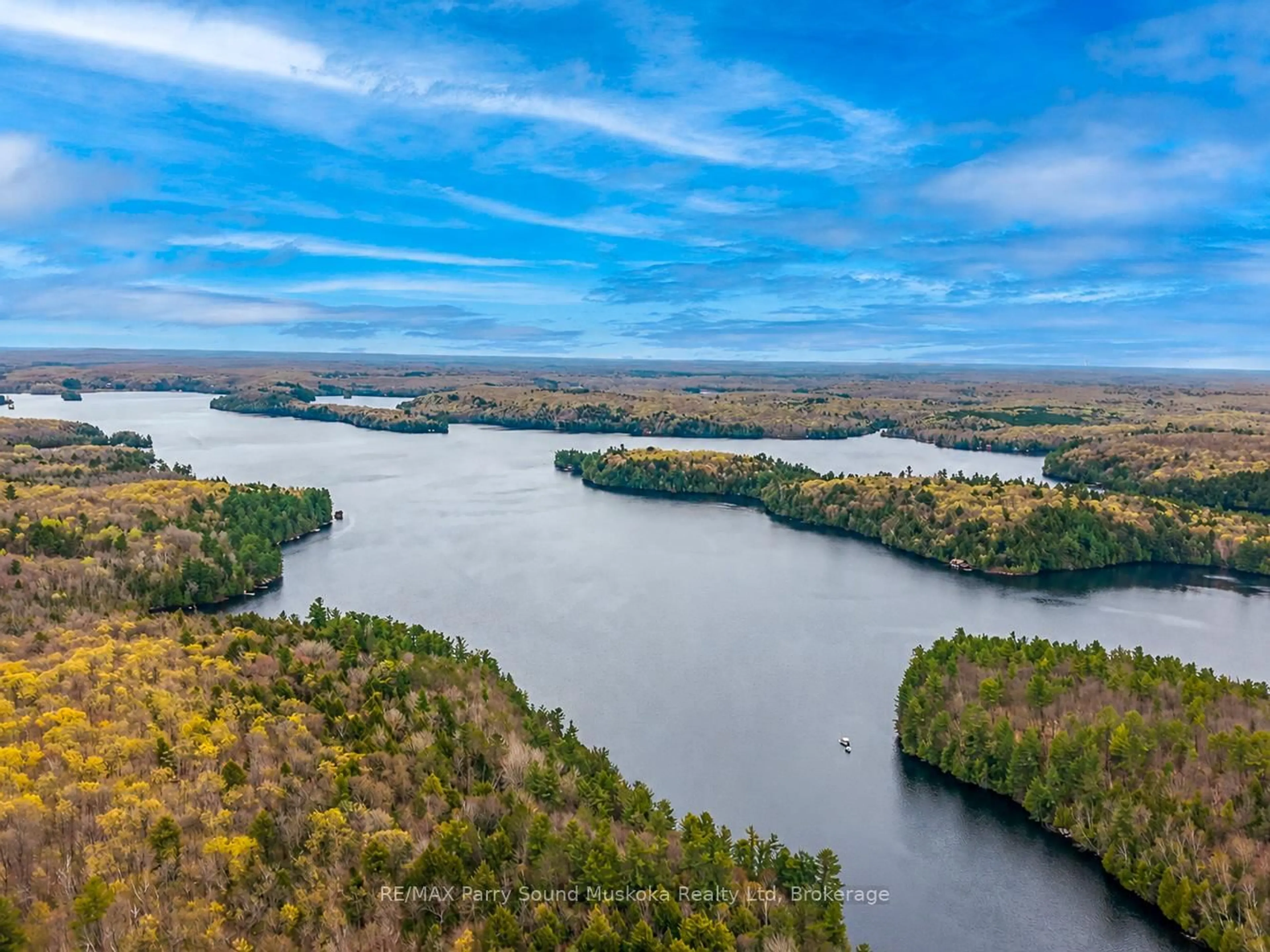 A pic from outside/outdoor area/front of a property/back of a property/a pic from drone, water/lake/river/ocean view for 179 Woodland Lane, Magnetawan Ontario P0A 1P0