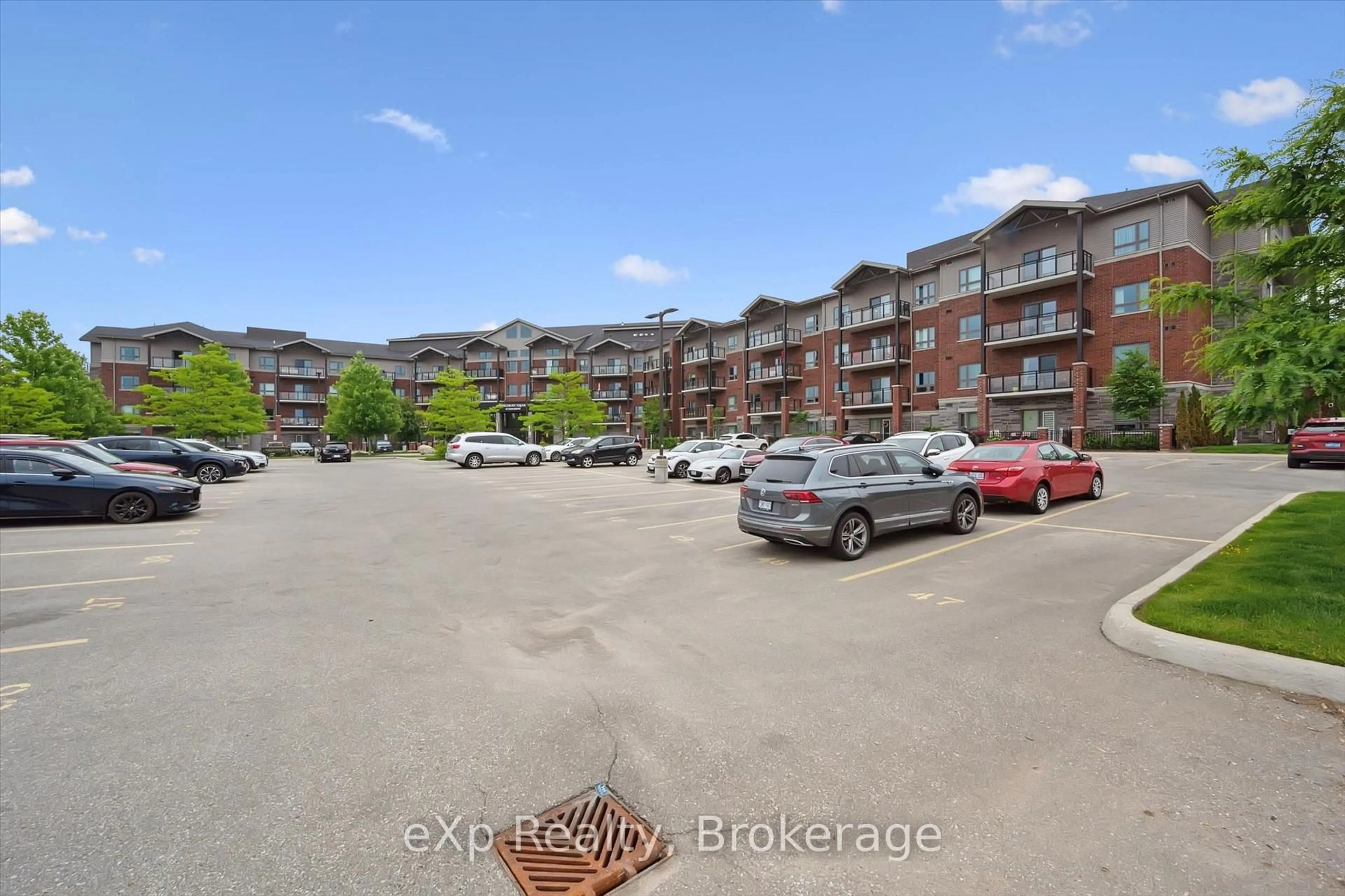 A pic from outside/outdoor area/front of a property/back of a property/a pic from drone, mountain view for 35 Kingsbury Sq #214, Guelph Ontario N1L 0J4
