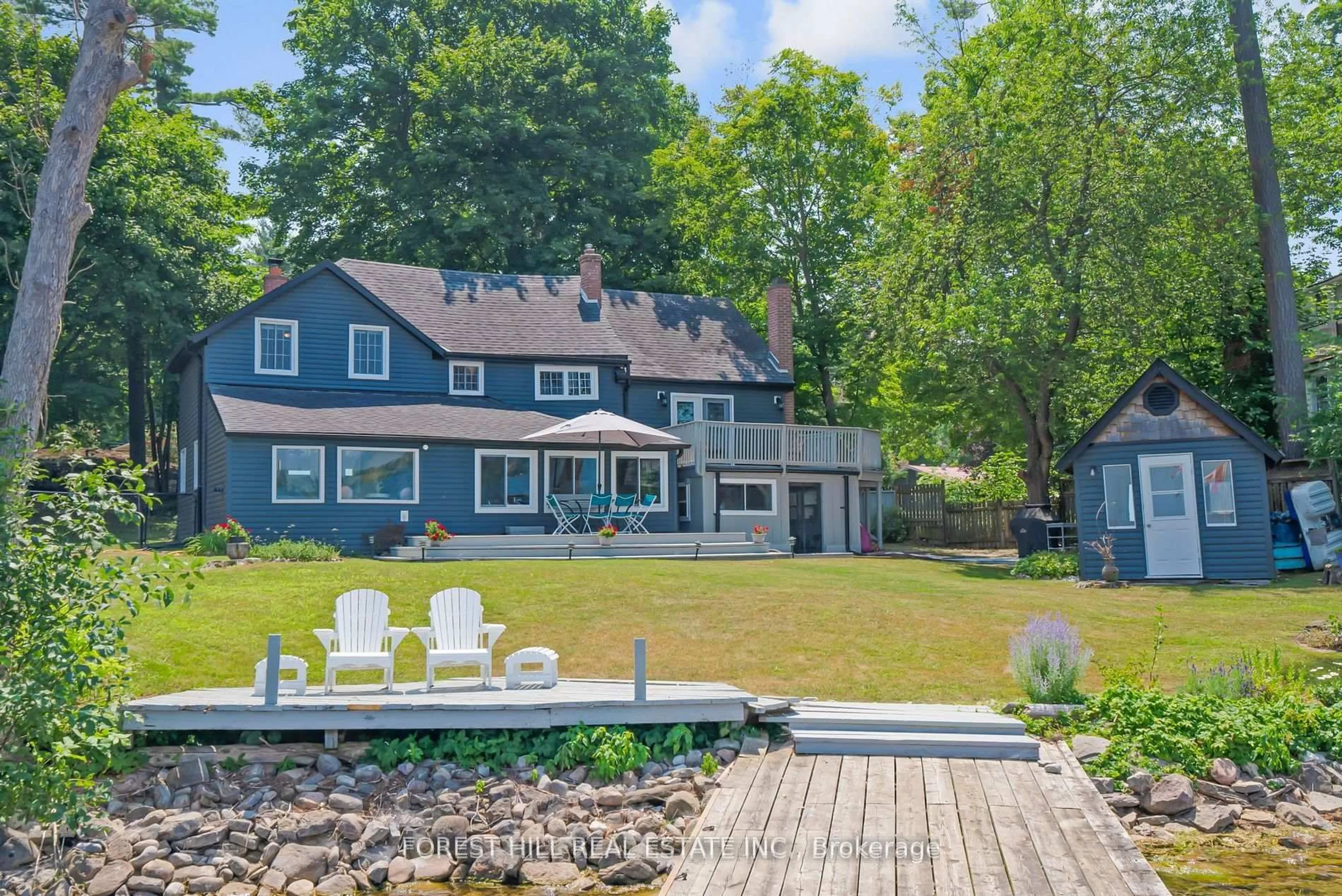 A pic from outside/outdoor area/front of a property/back of a property/a pic from drone, water/lake/river/ocean view for 672 Hatton Ave, Selwyn Ontario K0L 1H0