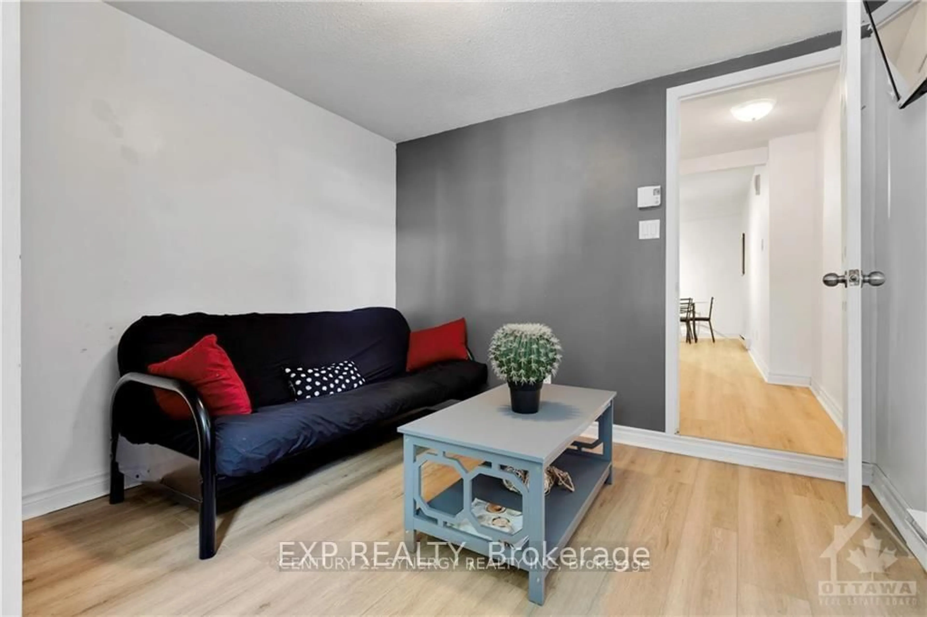 Living room with furniture, wood/laminate floor for 277 St Patrick St, Ottawa Ontario K1N 5K4