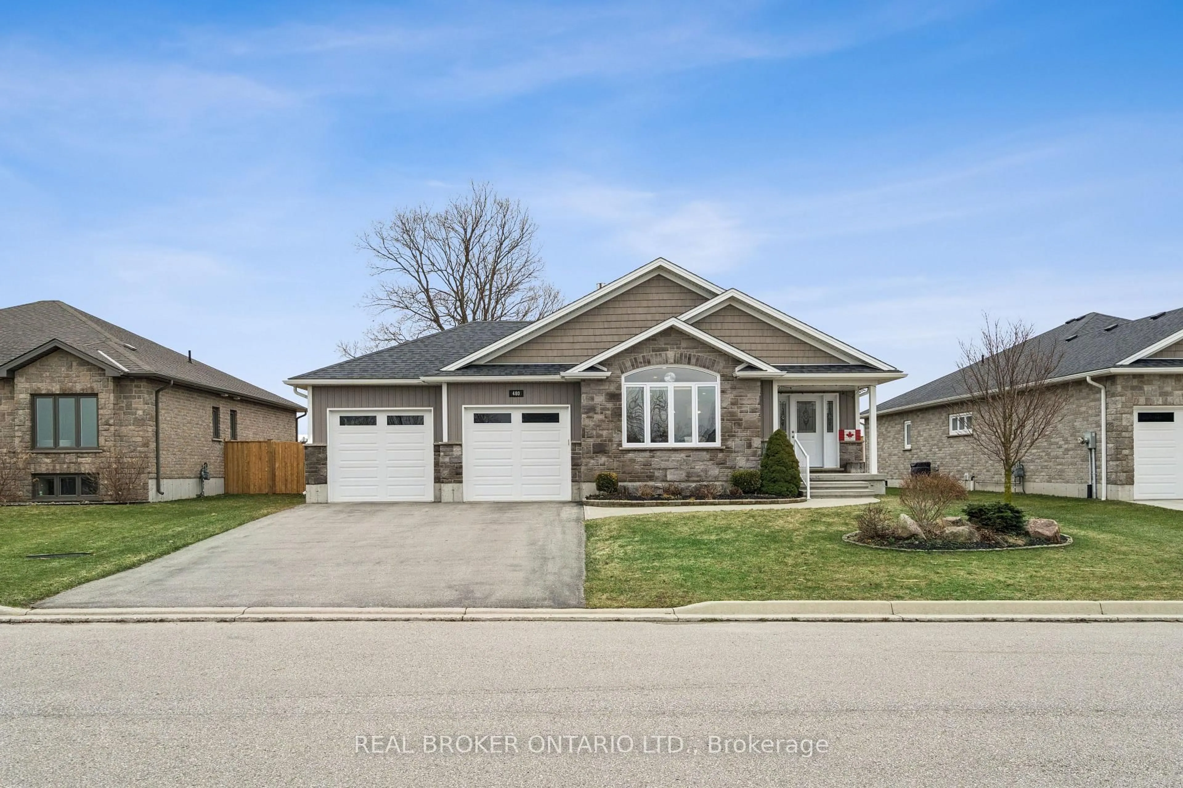 Home with brick exterior material, street for 480 Grand Trunk St, Minto Ontario N0G 2P0