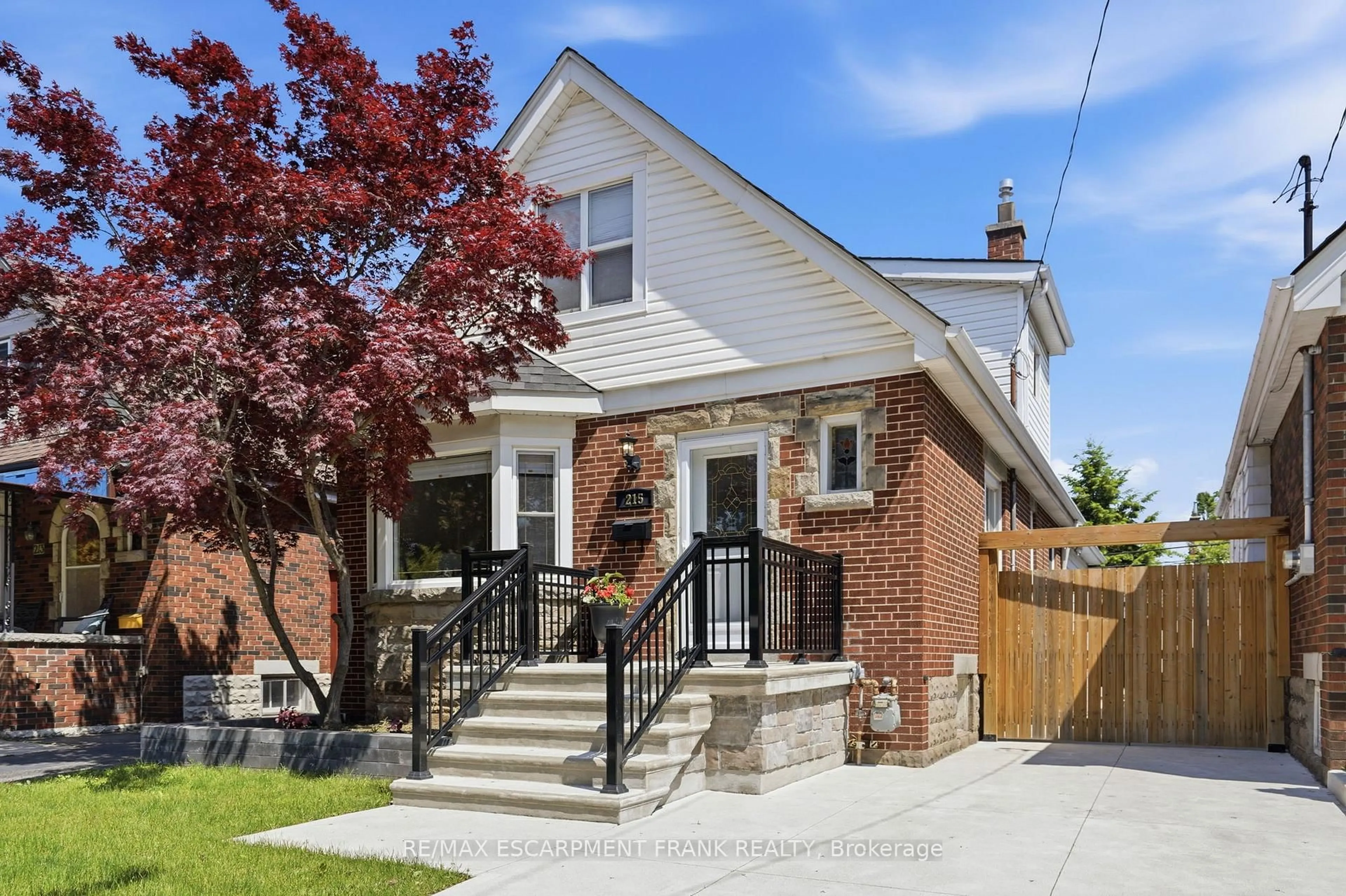 Home with brick exterior material, street for 215 Wexford Ave, Hamilton Ontario L8K 2P1