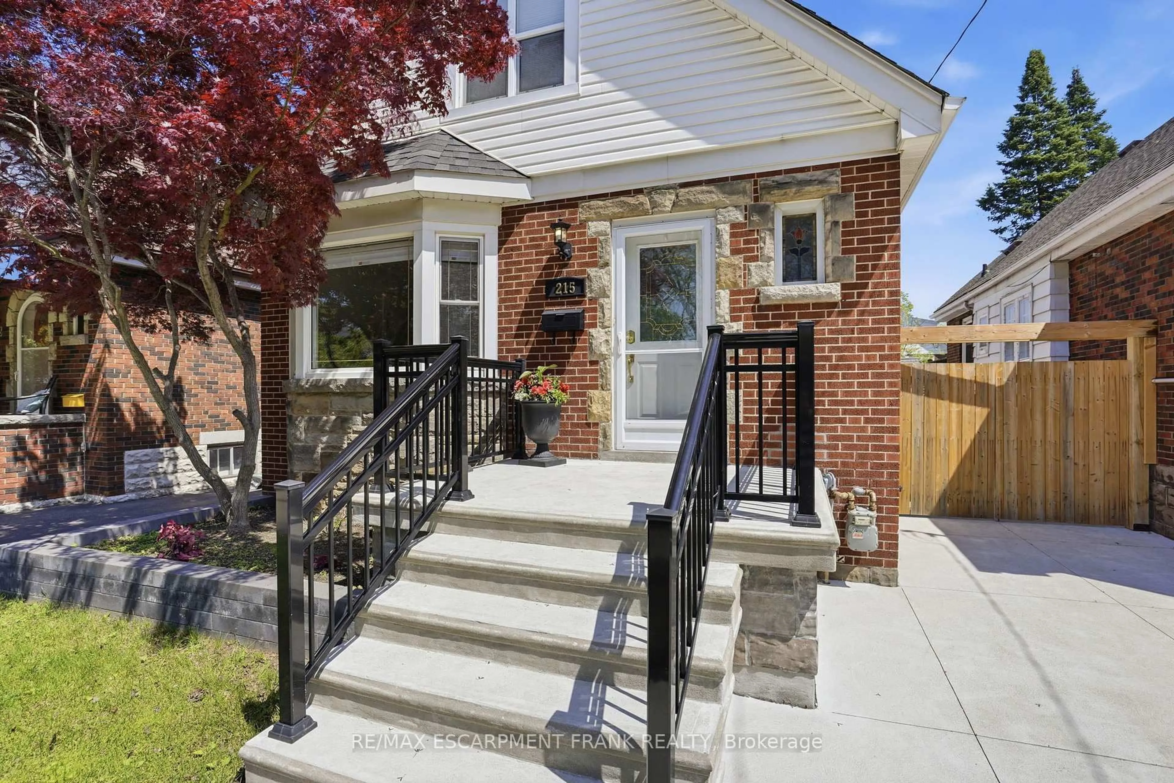 Home with brick exterior material, street for 215 Wexford Ave, Hamilton Ontario L8K 2P1