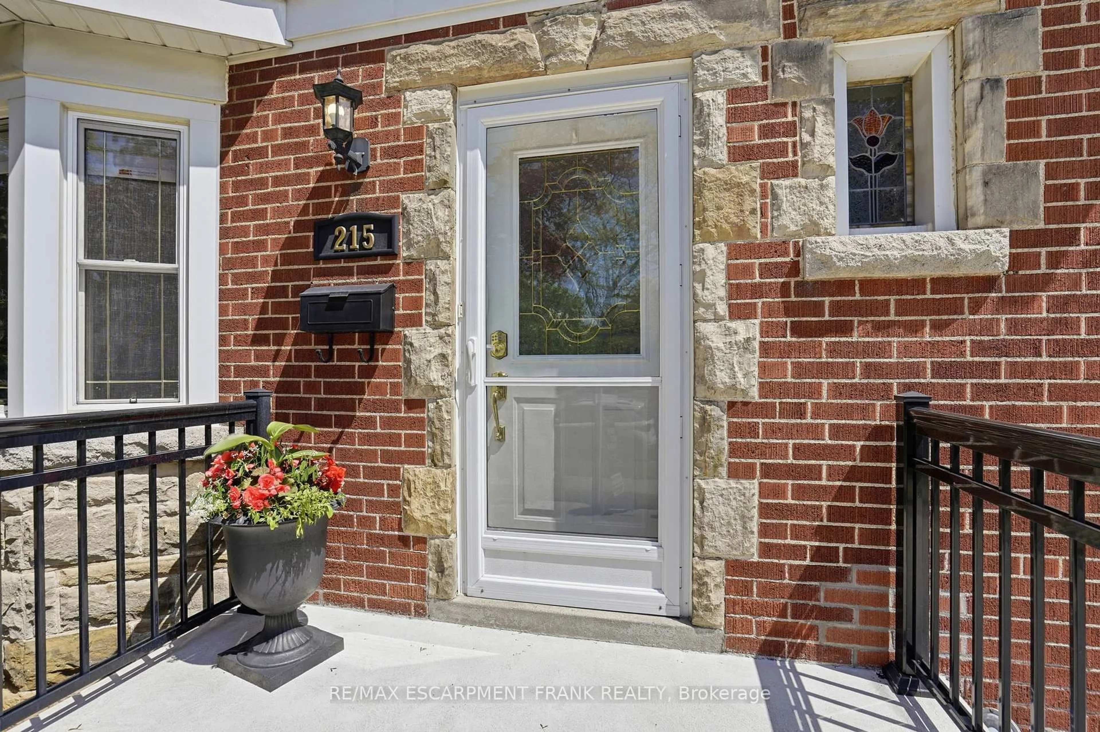 Home with brick exterior material, street for 215 Wexford Ave, Hamilton Ontario L8K 2P1