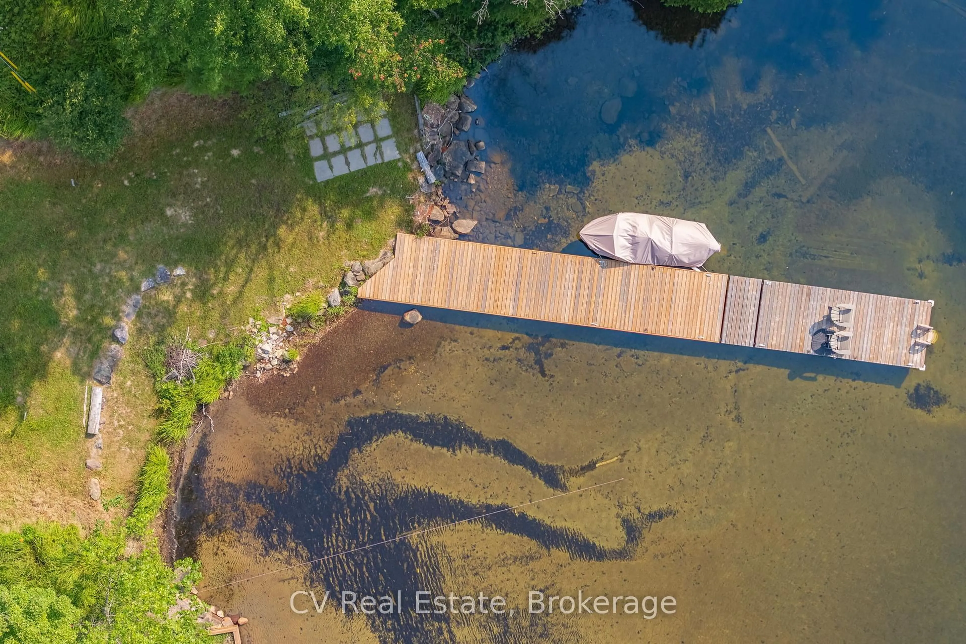 A pic from outside/outdoor area/front of a property/back of a property/a pic from drone, water/lake/river/ocean view for 1292 Port Cunnington Rd, Lake of Bays Ontario P0A 1H0