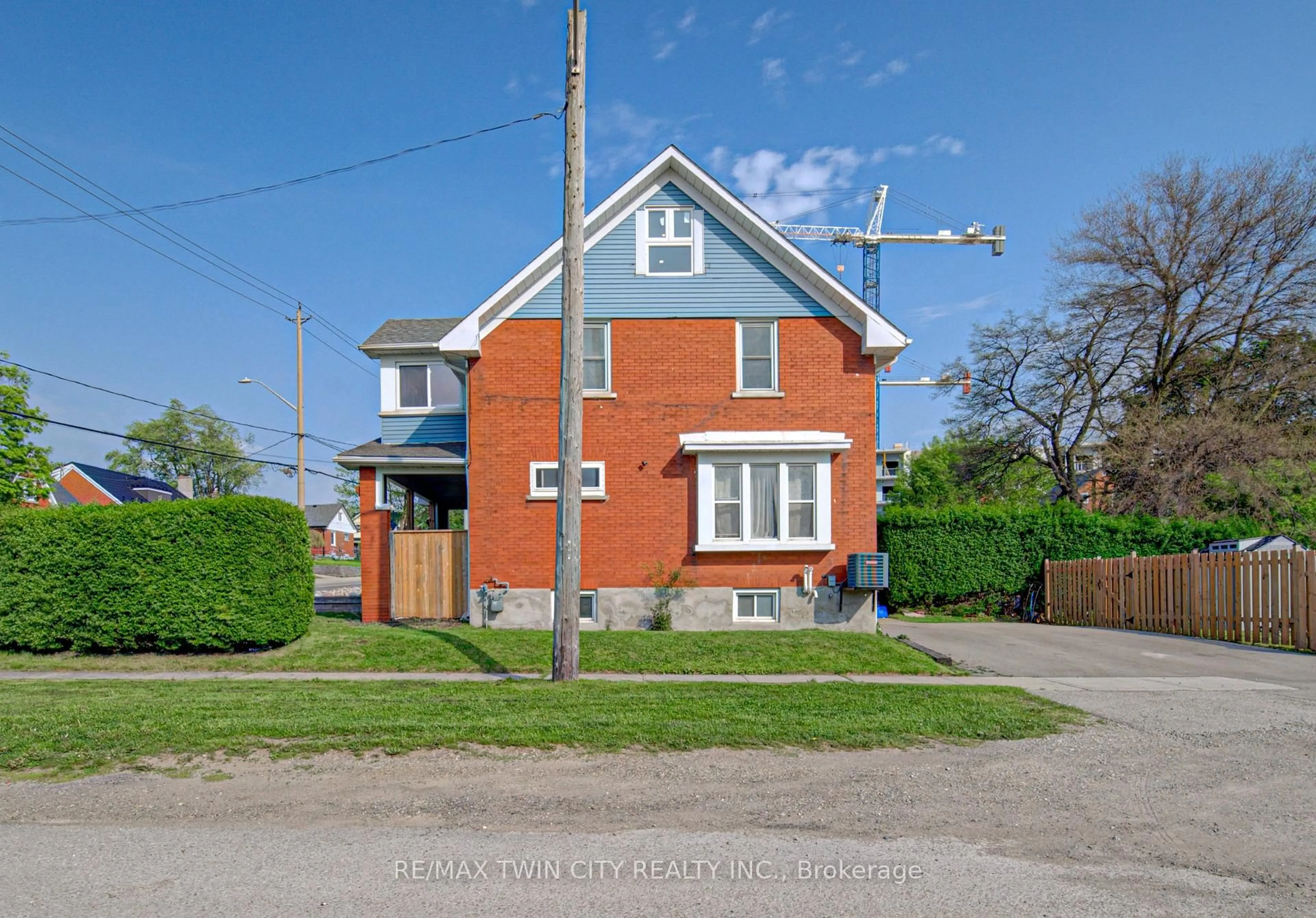 Home with brick exterior material, street for 281 Courtland Ave, Kitchener Ontario N2G 2V8
