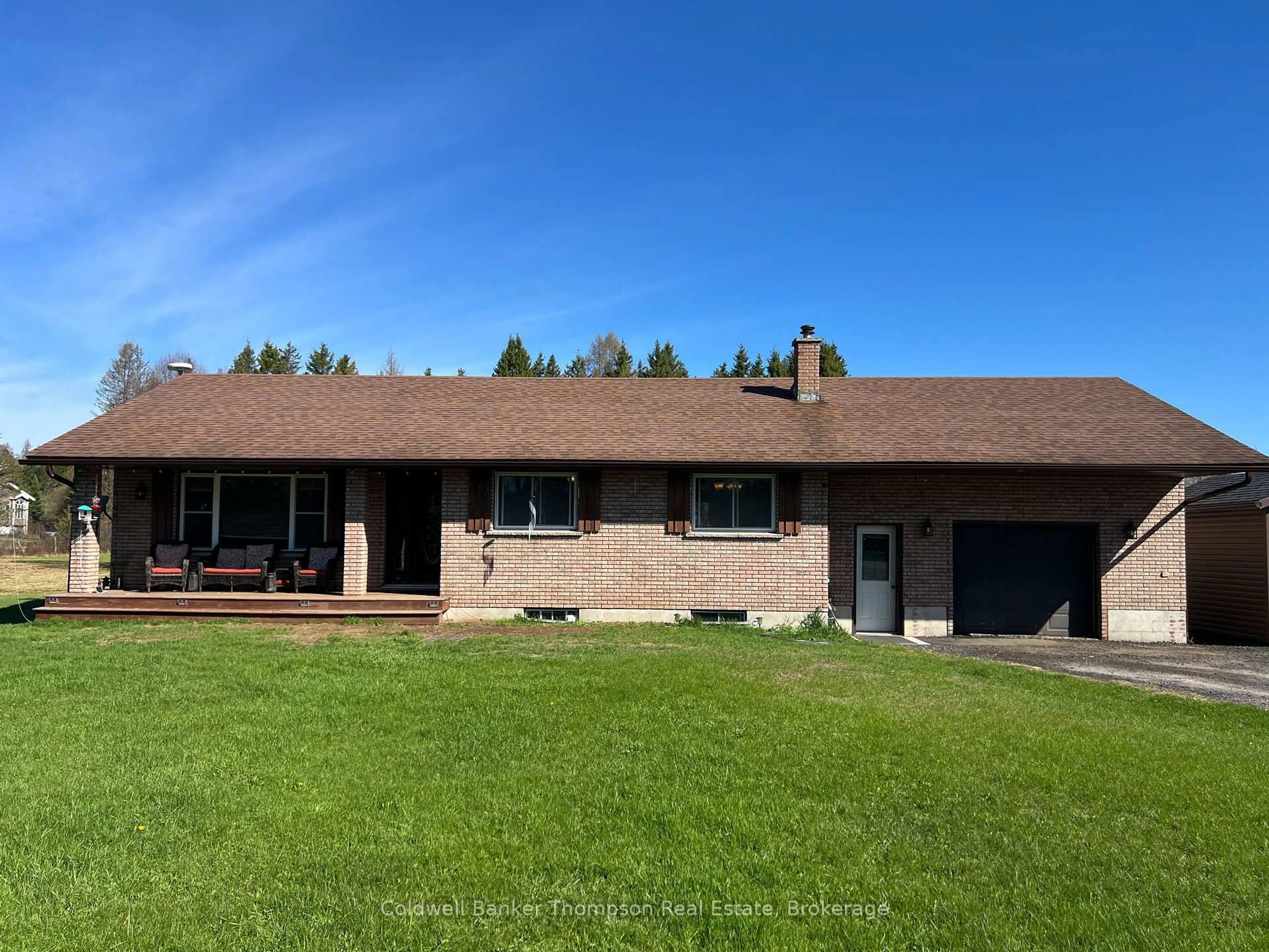 A pic from outside/outdoor area/front of a property/back of a property/a pic from drone, unknown for 590 Eagle Lake Rd, Machar Ontario P0A 1X0