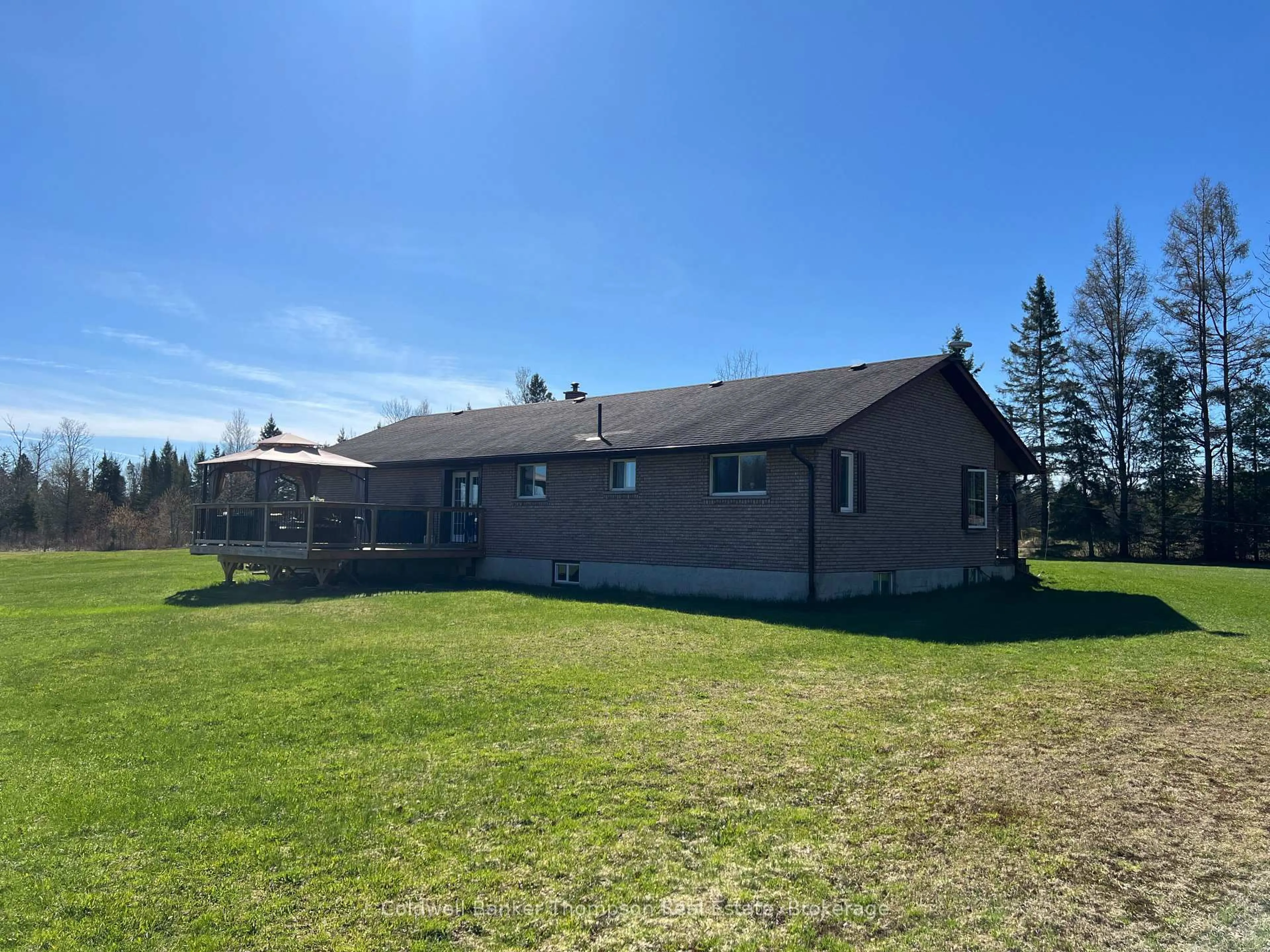 A pic from outside/outdoor area/front of a property/back of a property/a pic from drone, building for 590 Eagle Lake Rd, Machar Ontario P0A 1X0