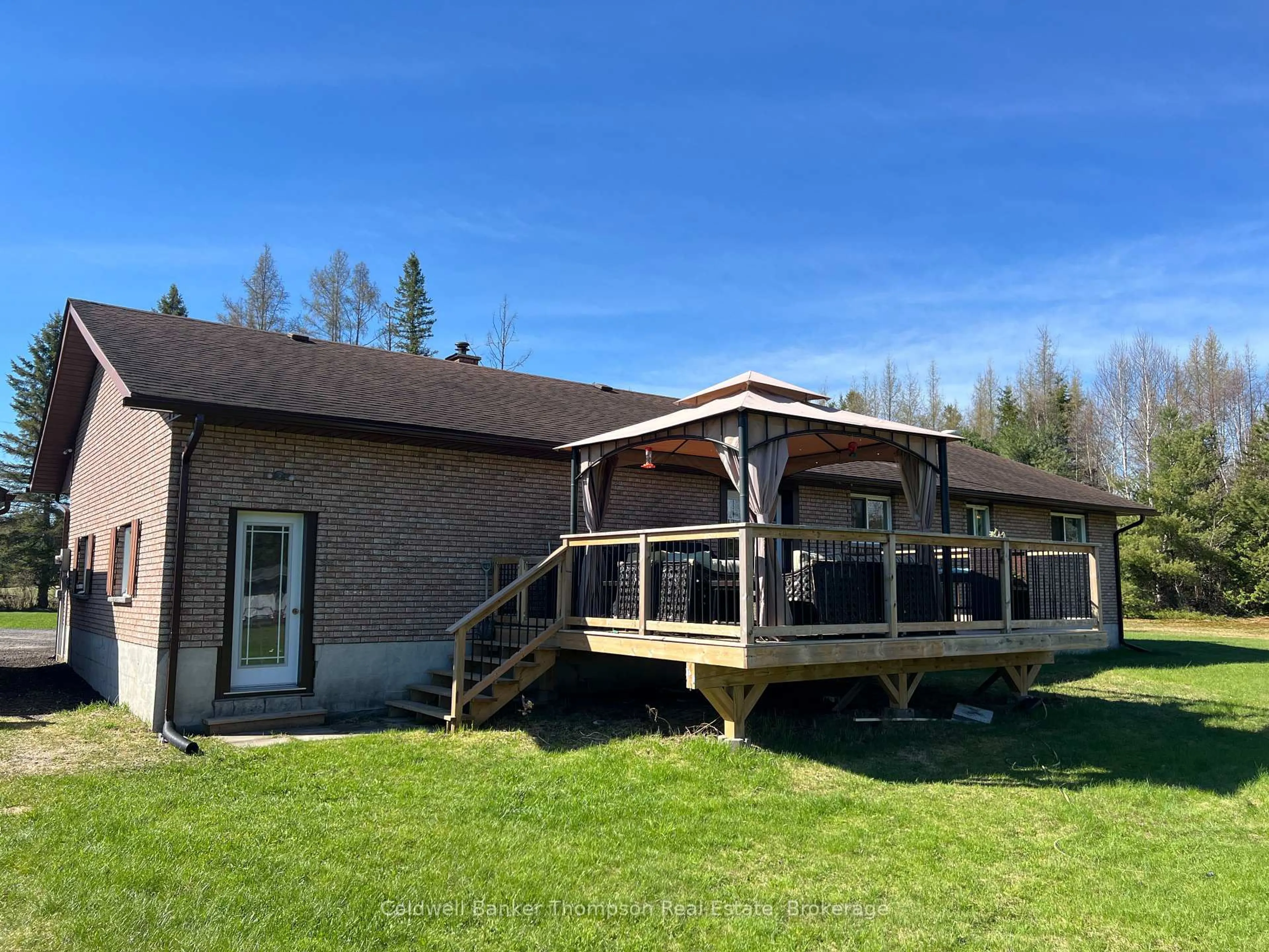 A pic from outside/outdoor area/front of a property/back of a property/a pic from drone, unknown for 590 Eagle Lake Rd, Machar Ontario P0A 1X0
