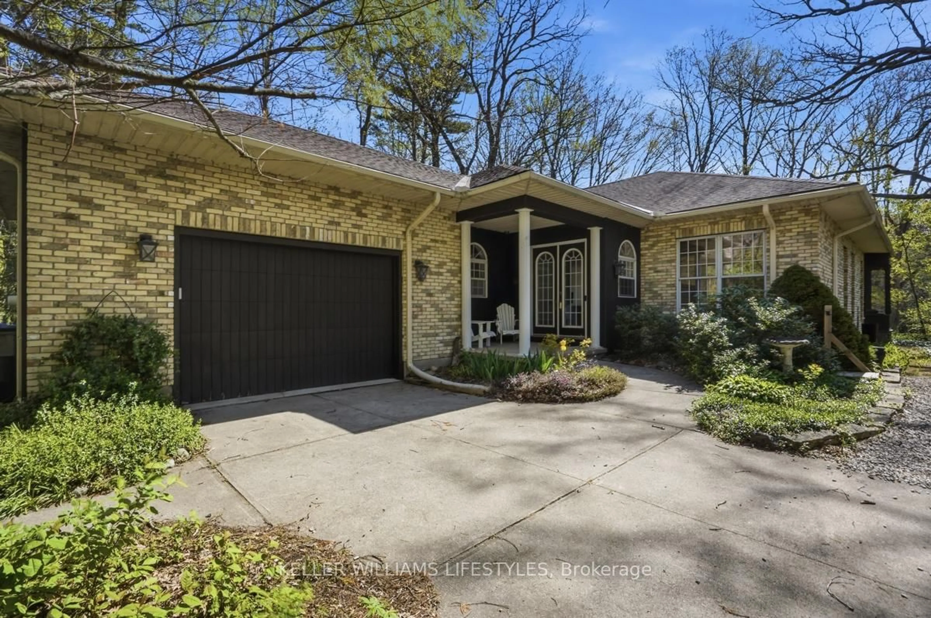 Home with brick exterior material, street for 10240 Woodpark Crt, Lambton Shores Ontario N0M 1T0