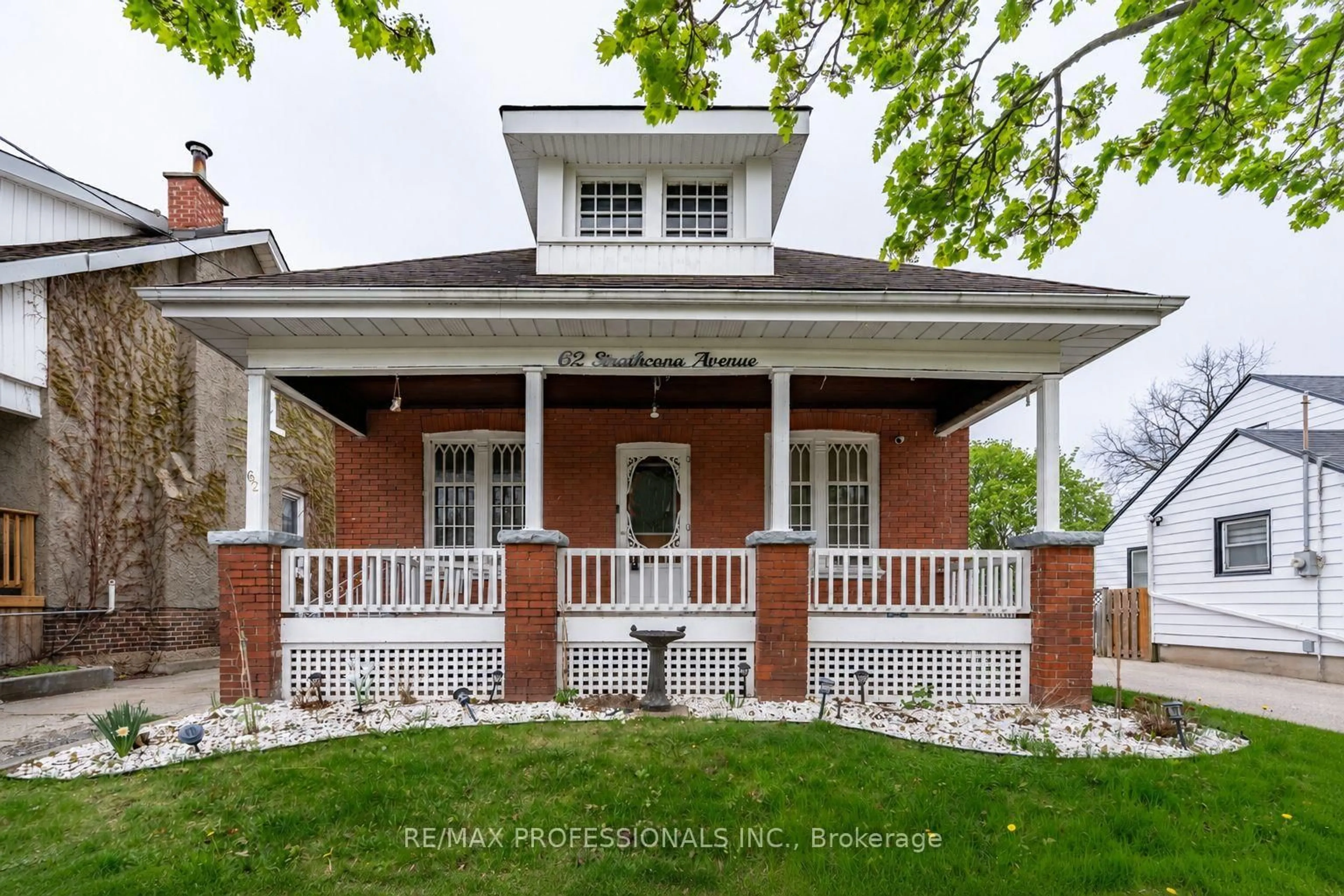 Home with brick exterior material, street for 62 Strathcona Ave, Brantford Ontario N3S 1T8