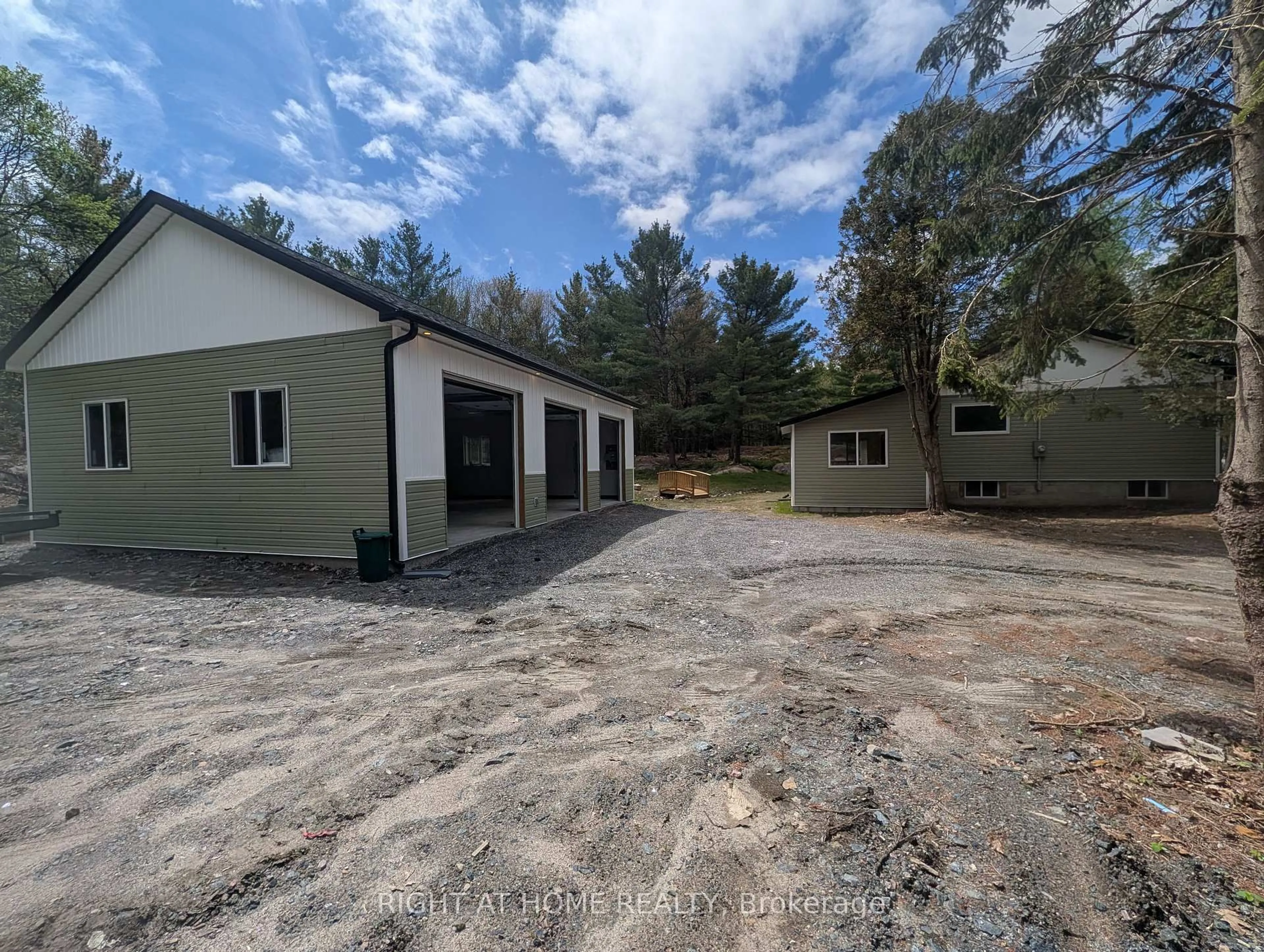 A pic from outside/outdoor area/front of a property/back of a property/a pic from drone, building for 44 559 Highway, Carling Ontario P0G 1G0