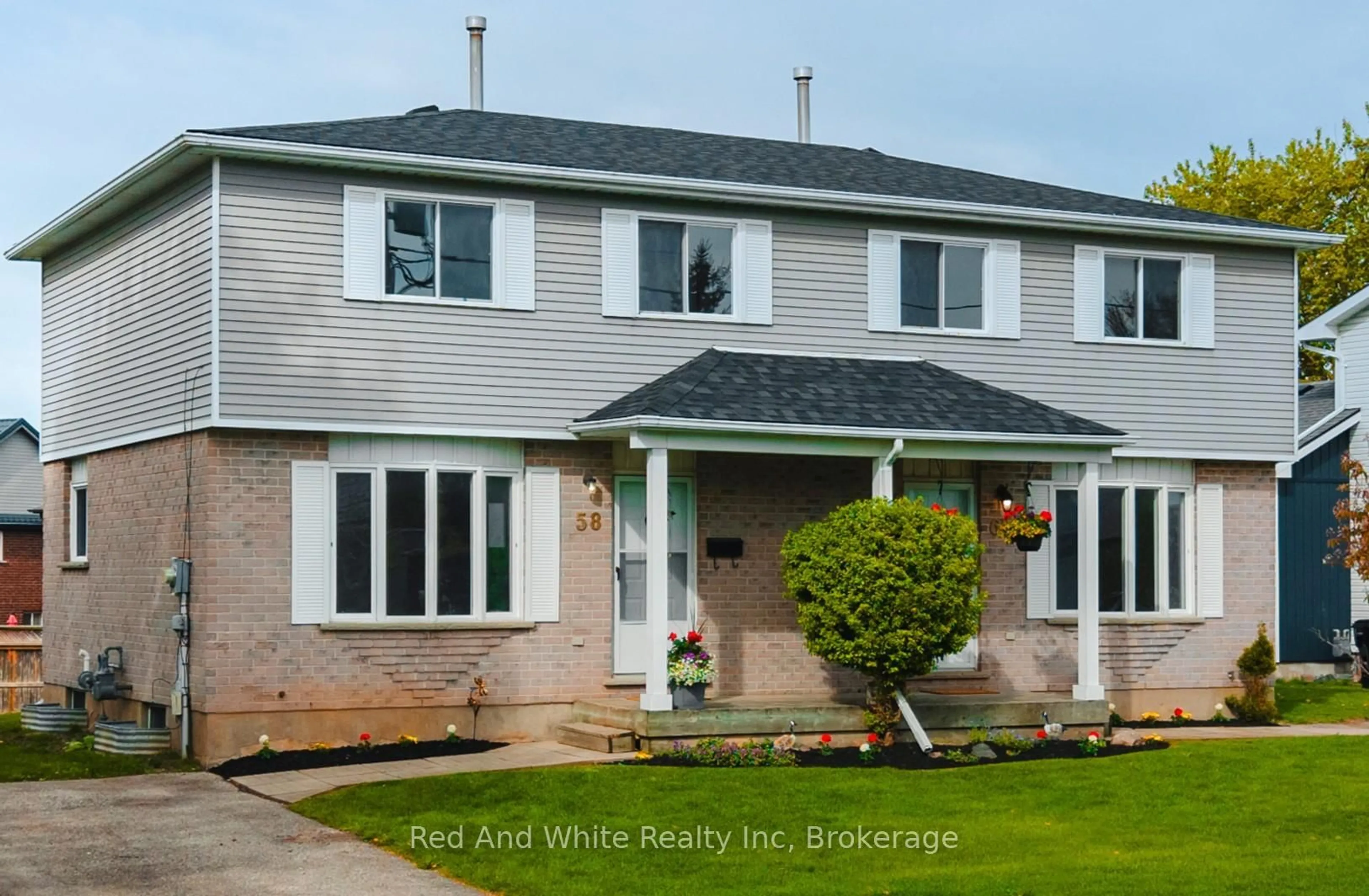 Home with vinyl exterior material, street for 58 Catherine St, Wilmot Ontario N3A 1Z8