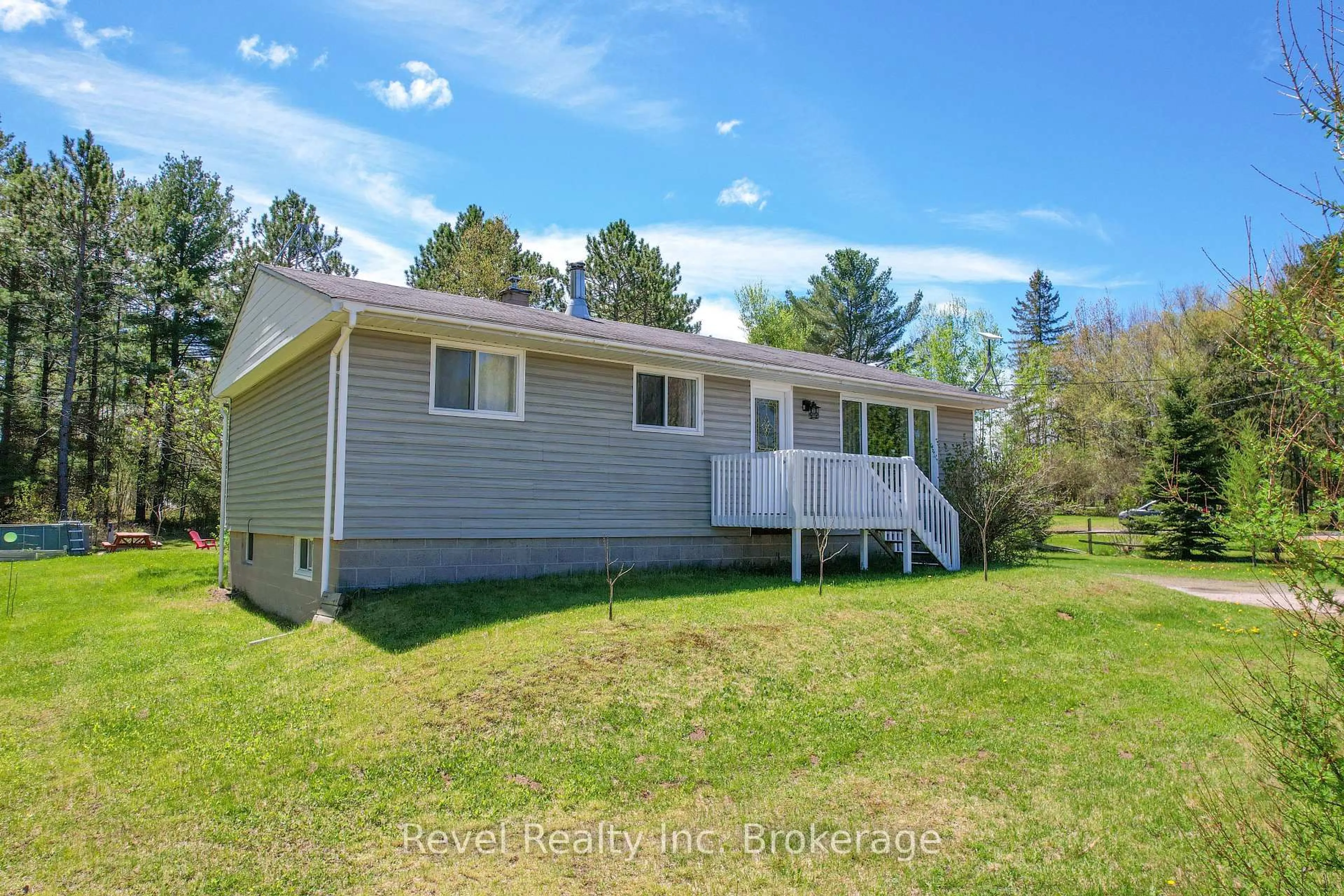 A pic from outside/outdoor area/front of a property/back of a property/a pic from drone, water/lake/river/ocean view for 1827 Highway 654, Callander Ontario P0H 1H0