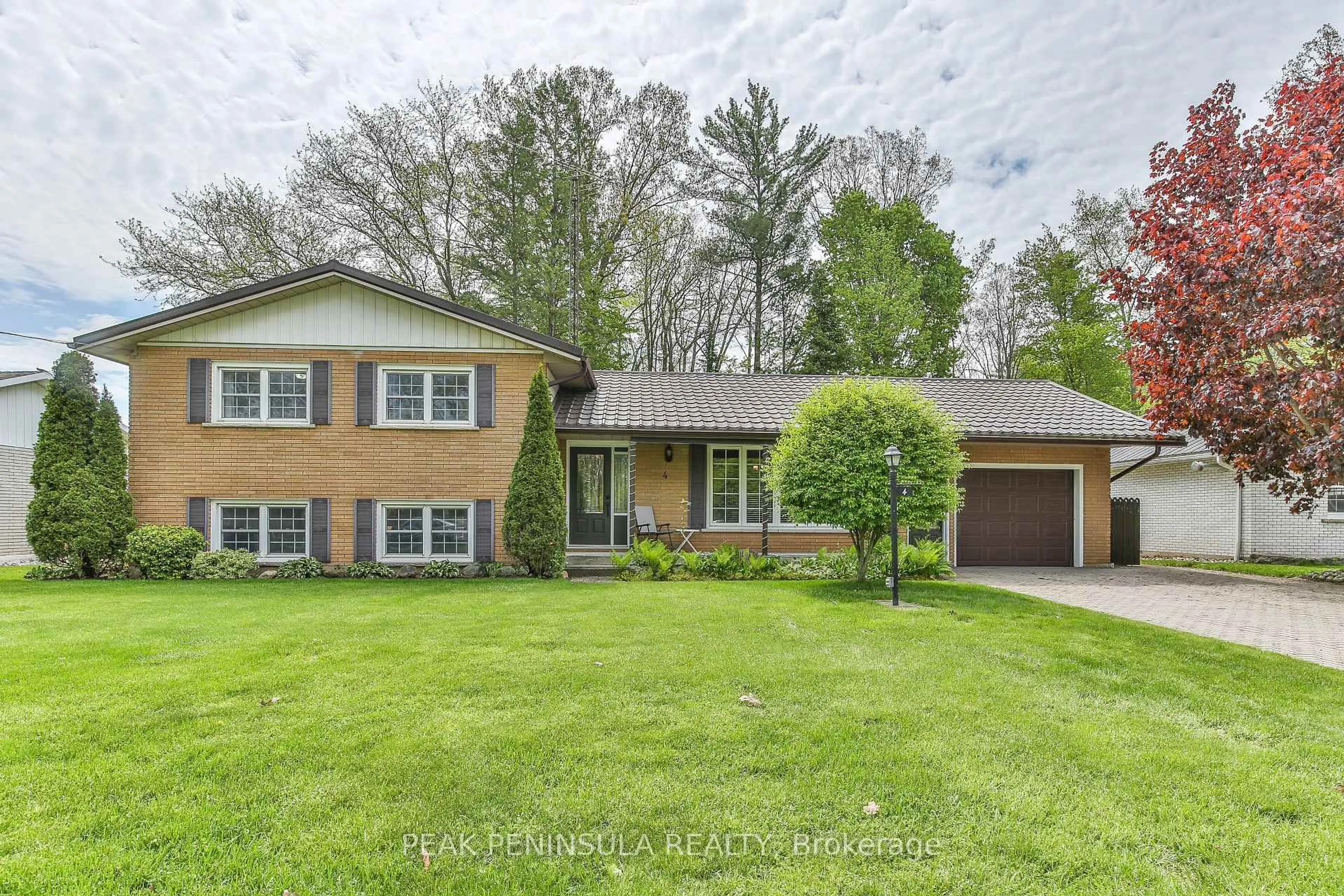 Home with brick exterior material, street for 4 Highland Dr, Tillsonburg Ontario N4G 2E9