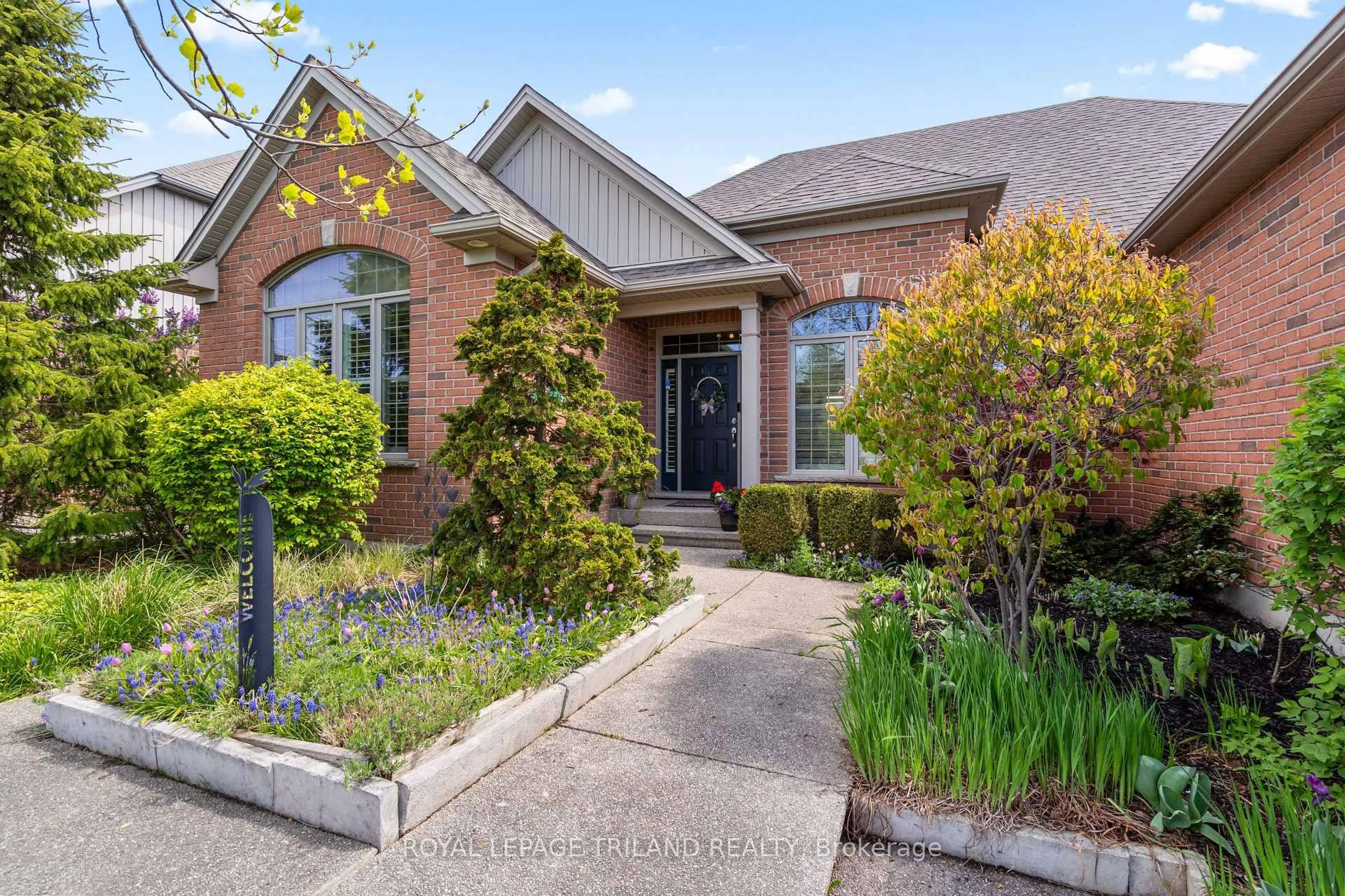 Home with brick exterior material, street for 56 Willow Ridge Rd, Middlesex Centre Ontario N0M 2A0