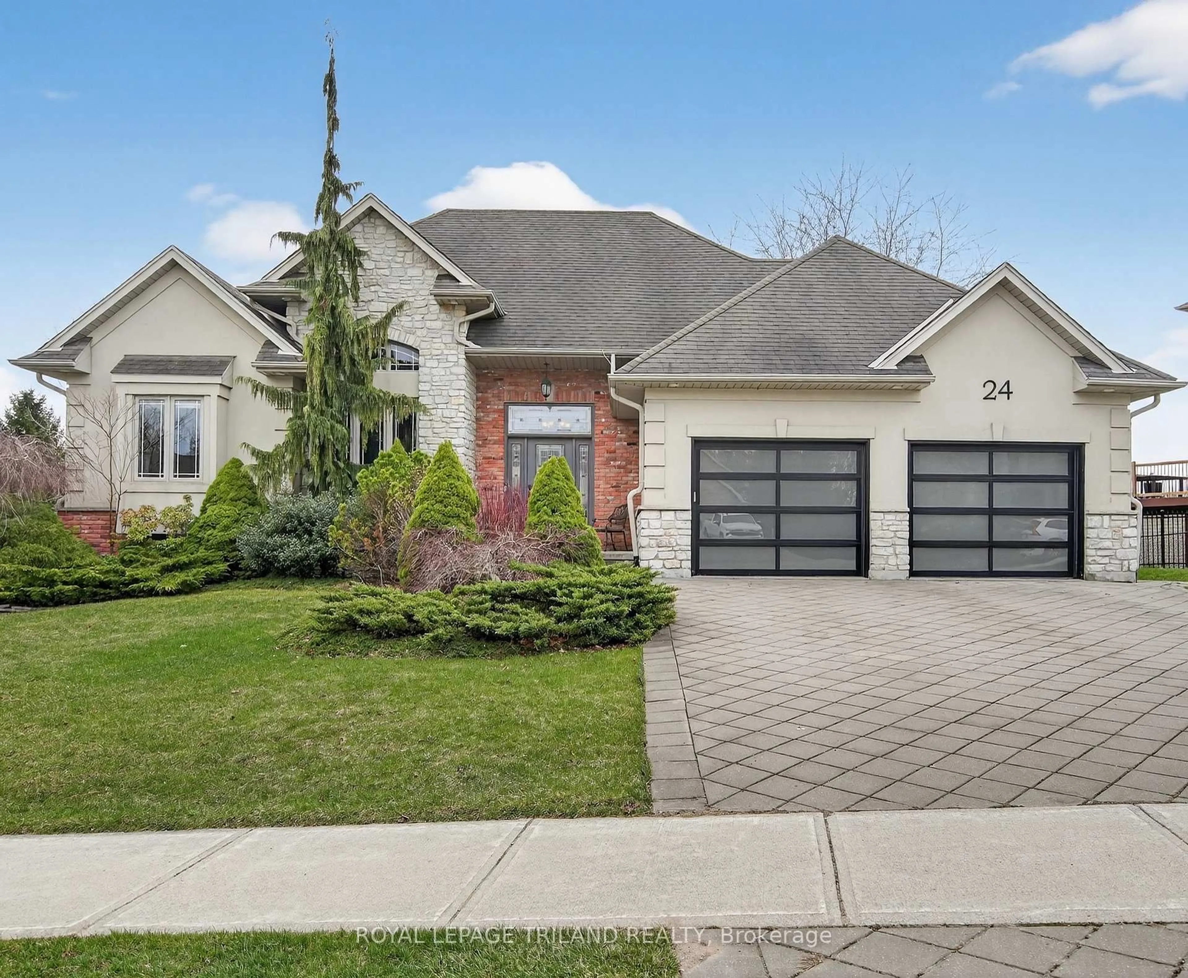 Home with brick exterior material, street for 24 Earlscourt Terr, Middlesex Centre Ontario N0L 1R0