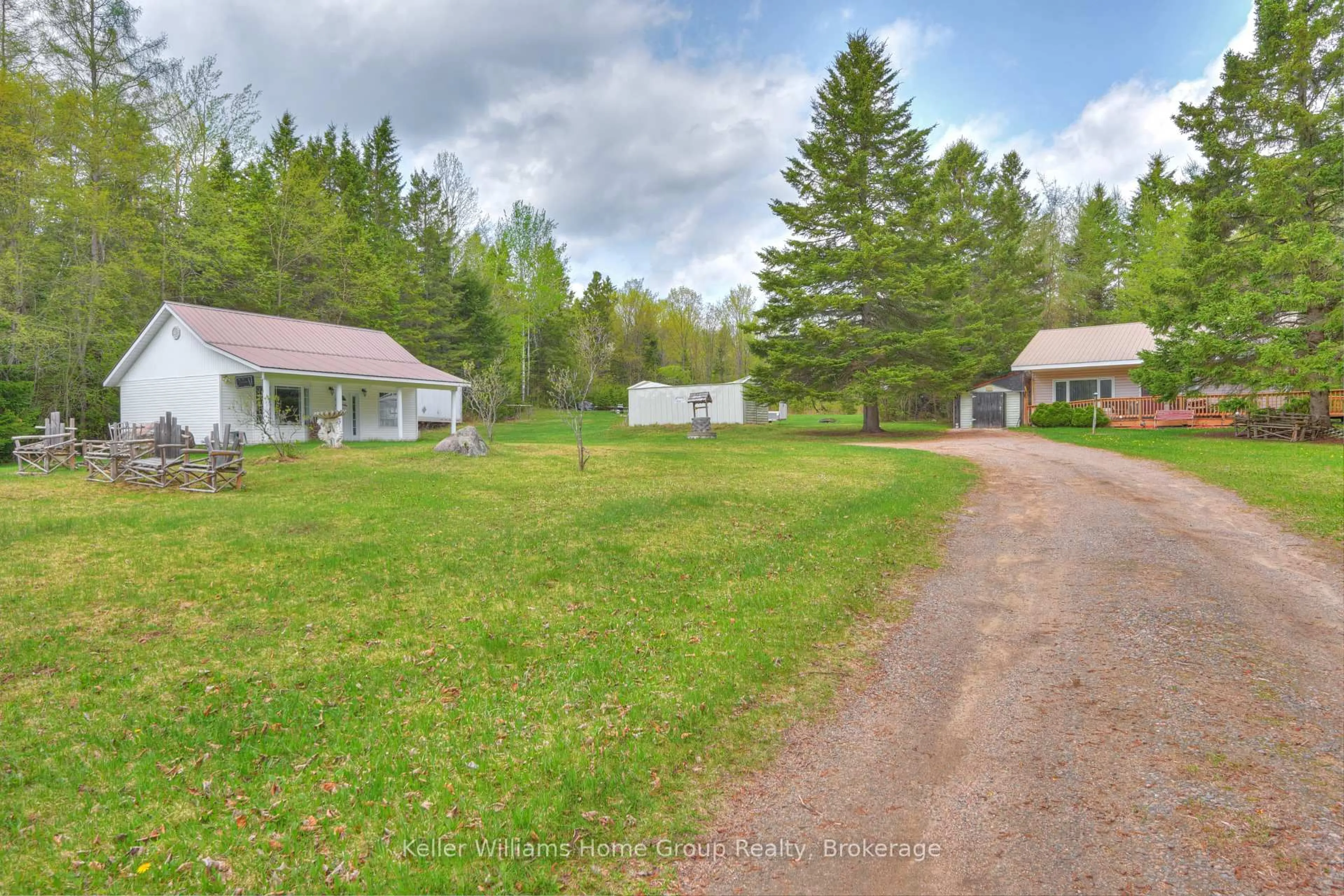A pic from outside/outdoor area/front of a property/back of a property/a pic from drone, unknown for 5311 Loop Rd, Highlands East Ontario K0L 2A0