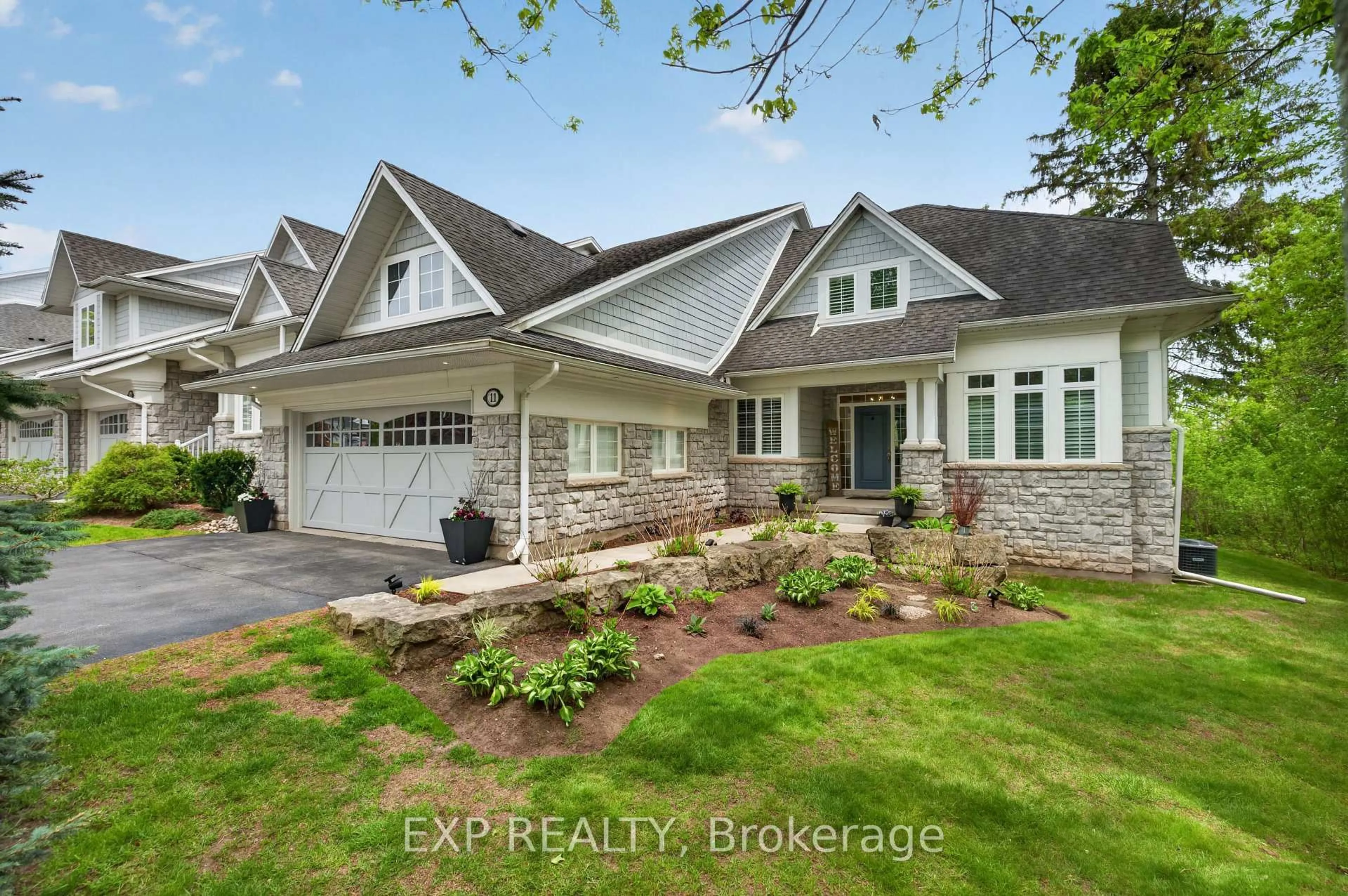 Home with brick exterior material, street for 3 Sims Estate Pl #11, Kitchener Ontario N2A 0A5