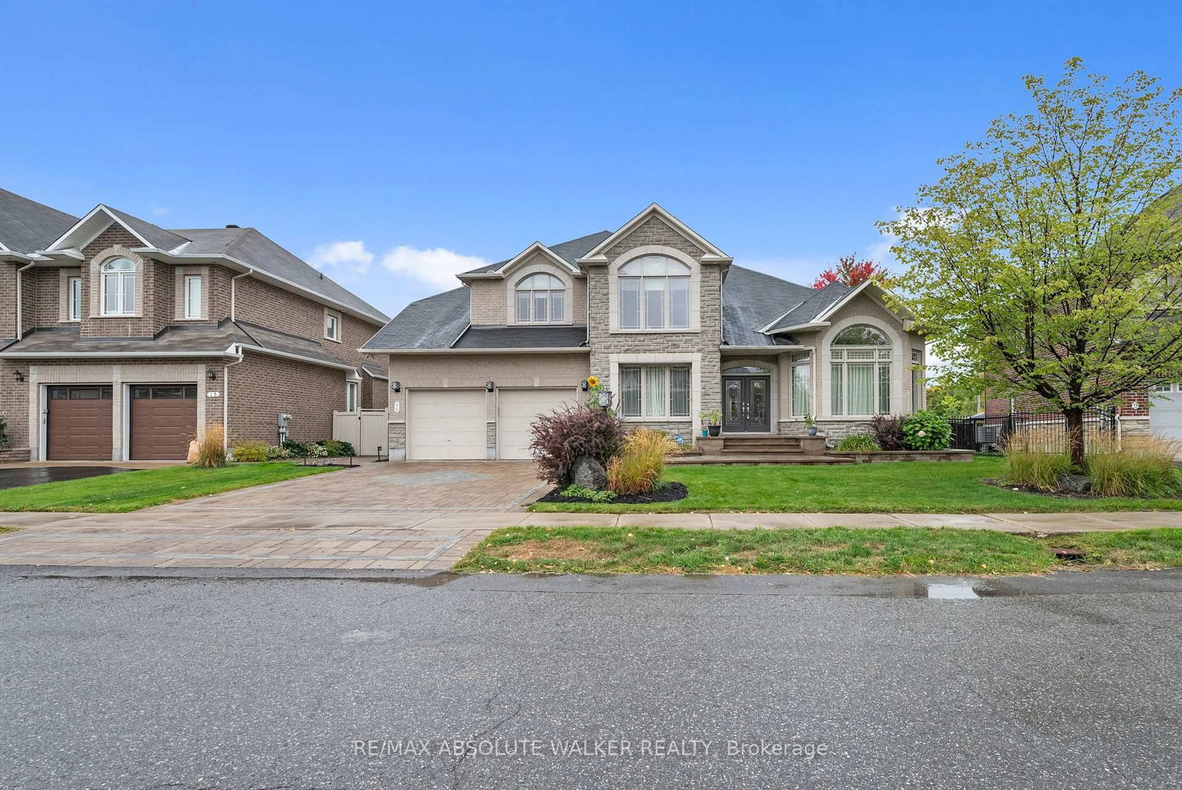 Home with vinyl exterior material, street for 11 Tradewinds Dr, Ottawa Ontario K2G 6Y4