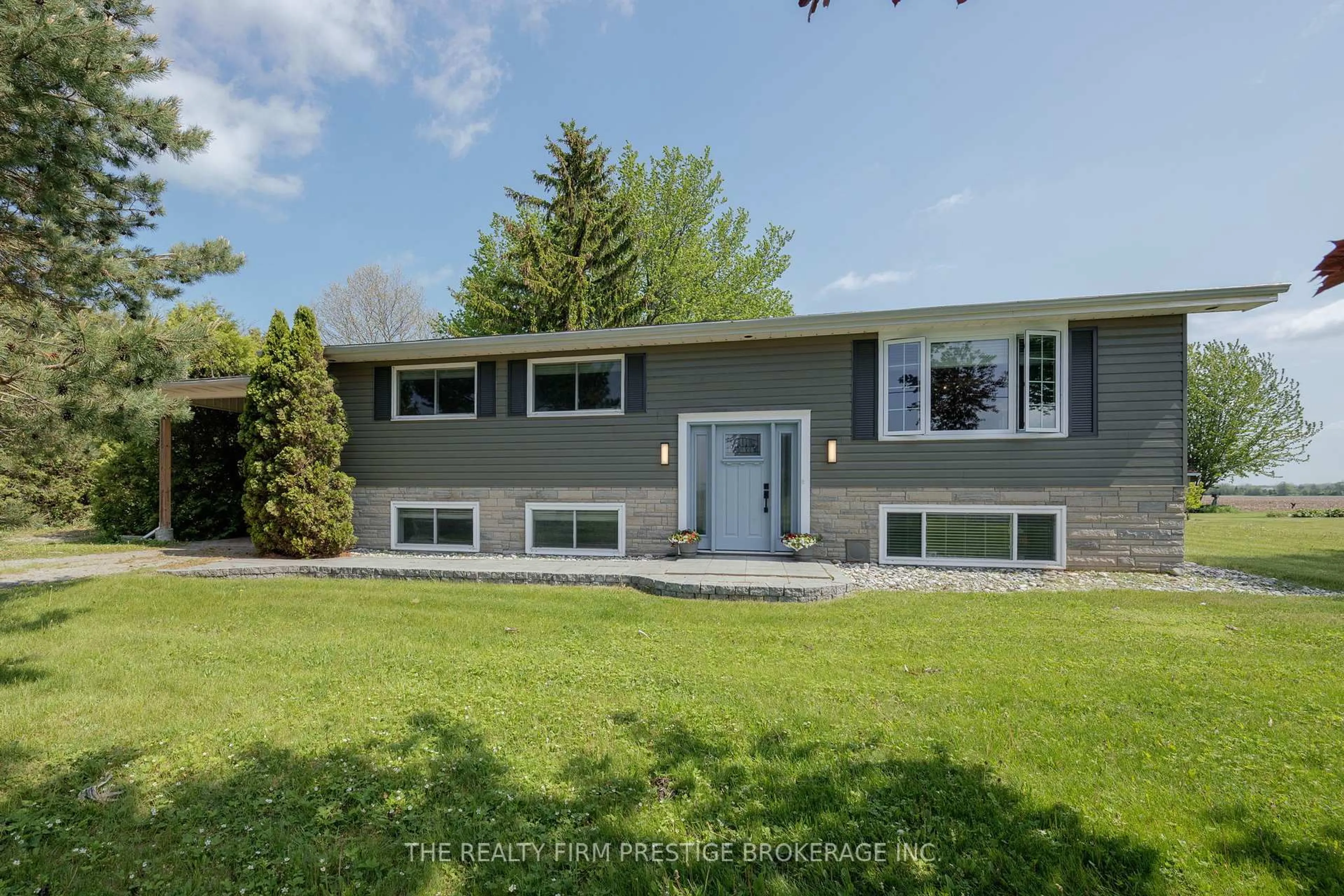 Home with vinyl exterior material, street for 34420 Gore Rd, South Huron Ontario N0M 1T0