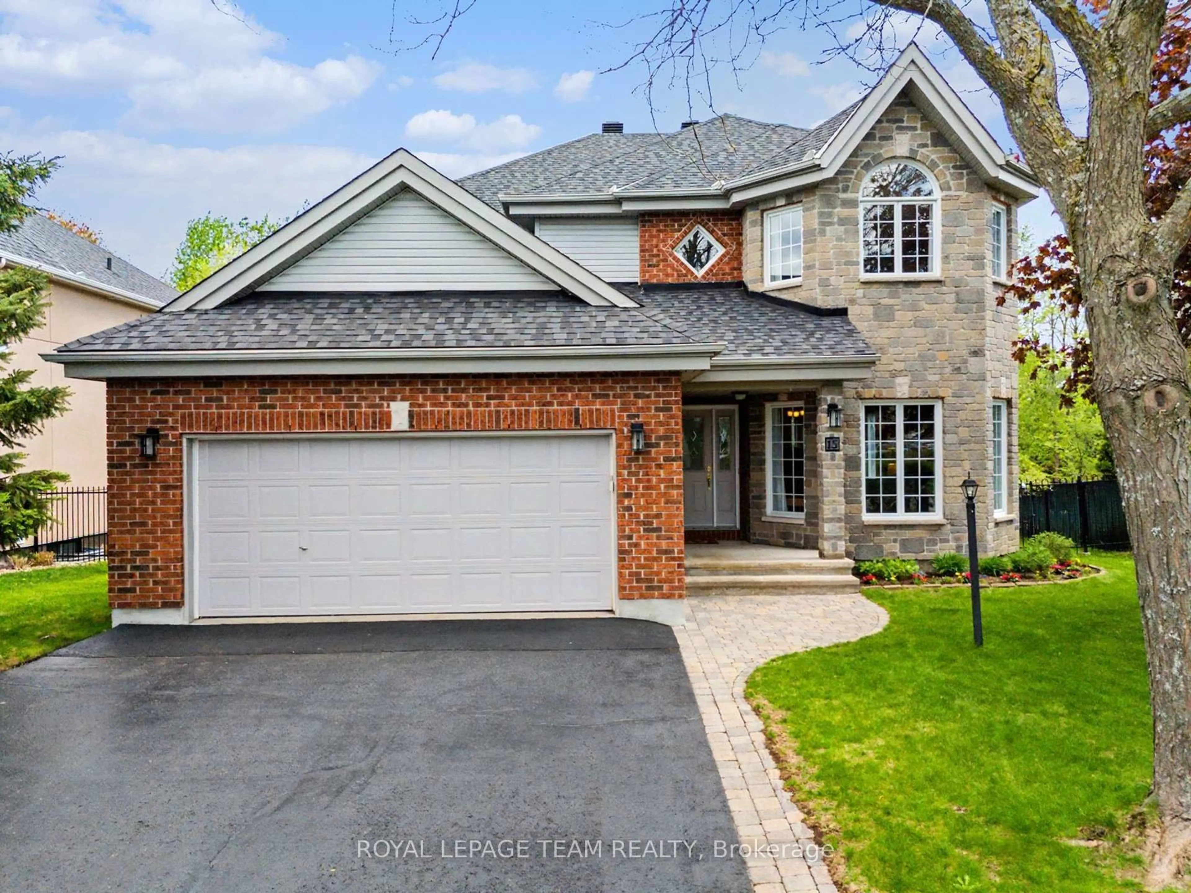 Home with brick exterior material, street for 15 Ladybirds Cres, Stittsville Ontario K2S 1Z6