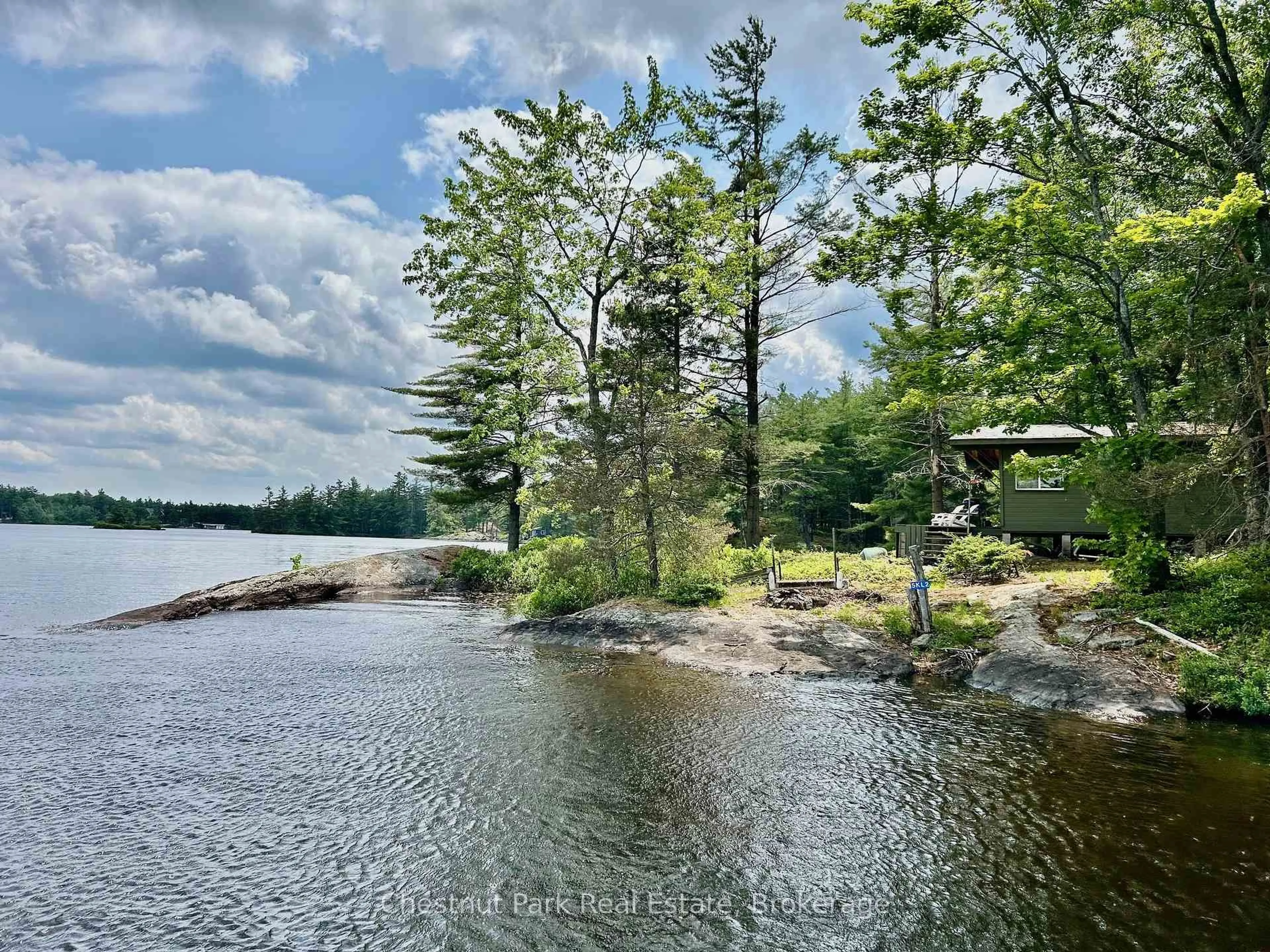 A pic from outside/outdoor area/front of a property/back of a property/a pic from drone, water/lake/river/ocean view for 2 Island 5KL Pa Burnt Island, Gravenhurst Ontario P0E 1G0