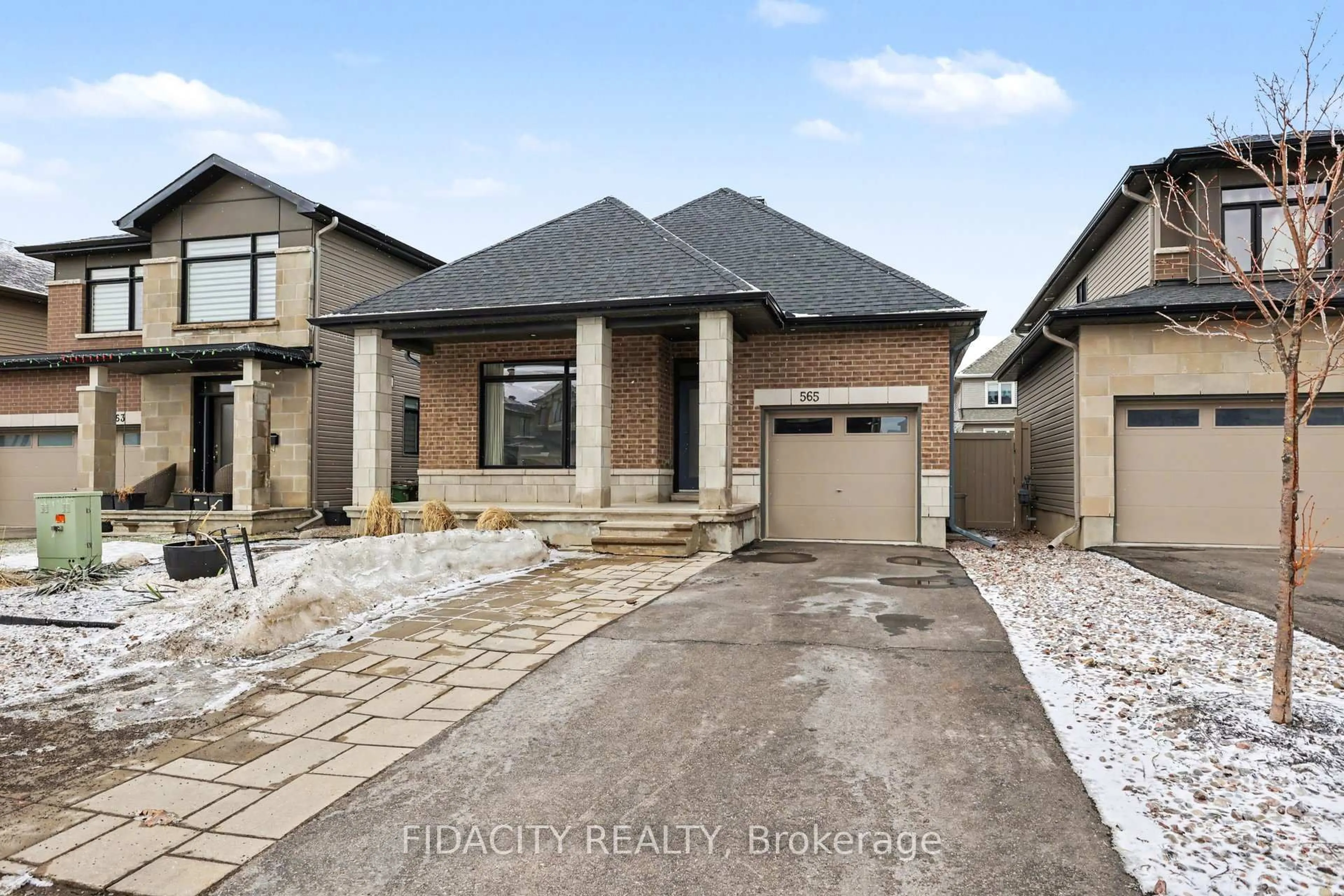 Home with brick exterior material, street for 565 Bobolink Rdge, Ottawa Ontario K2S 2P4