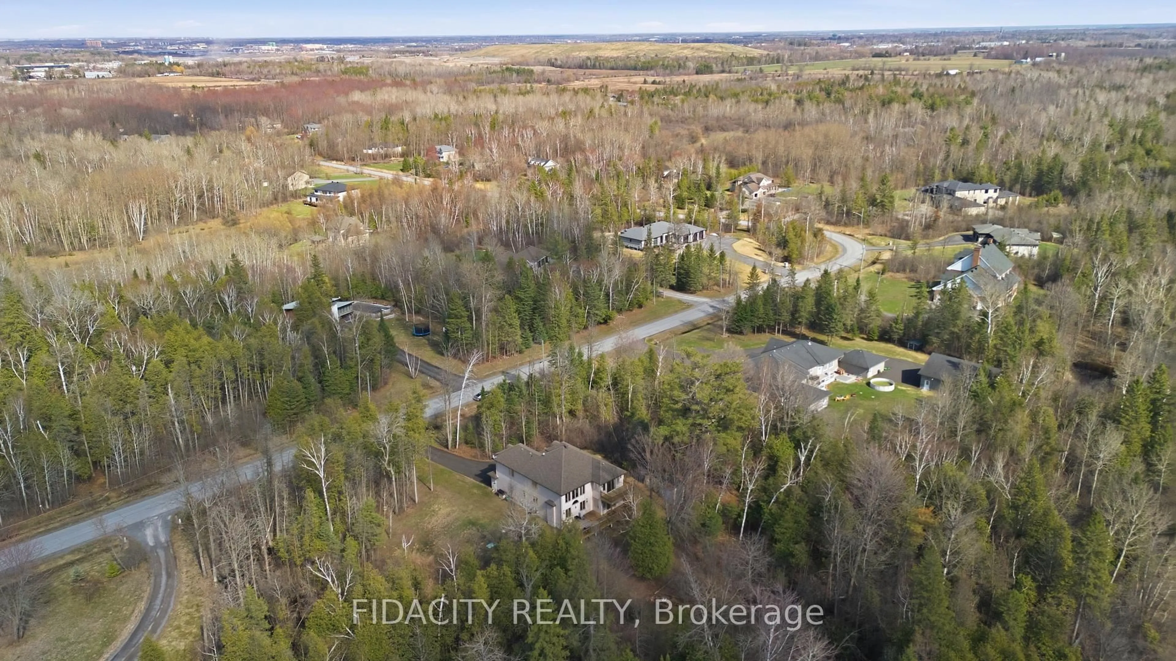 A pic from outside/outdoor area/front of a property/back of a property/a pic from drone, forest/trees view for 152 Wilbert Cox Dr, Carp Ontario K0A 1L0