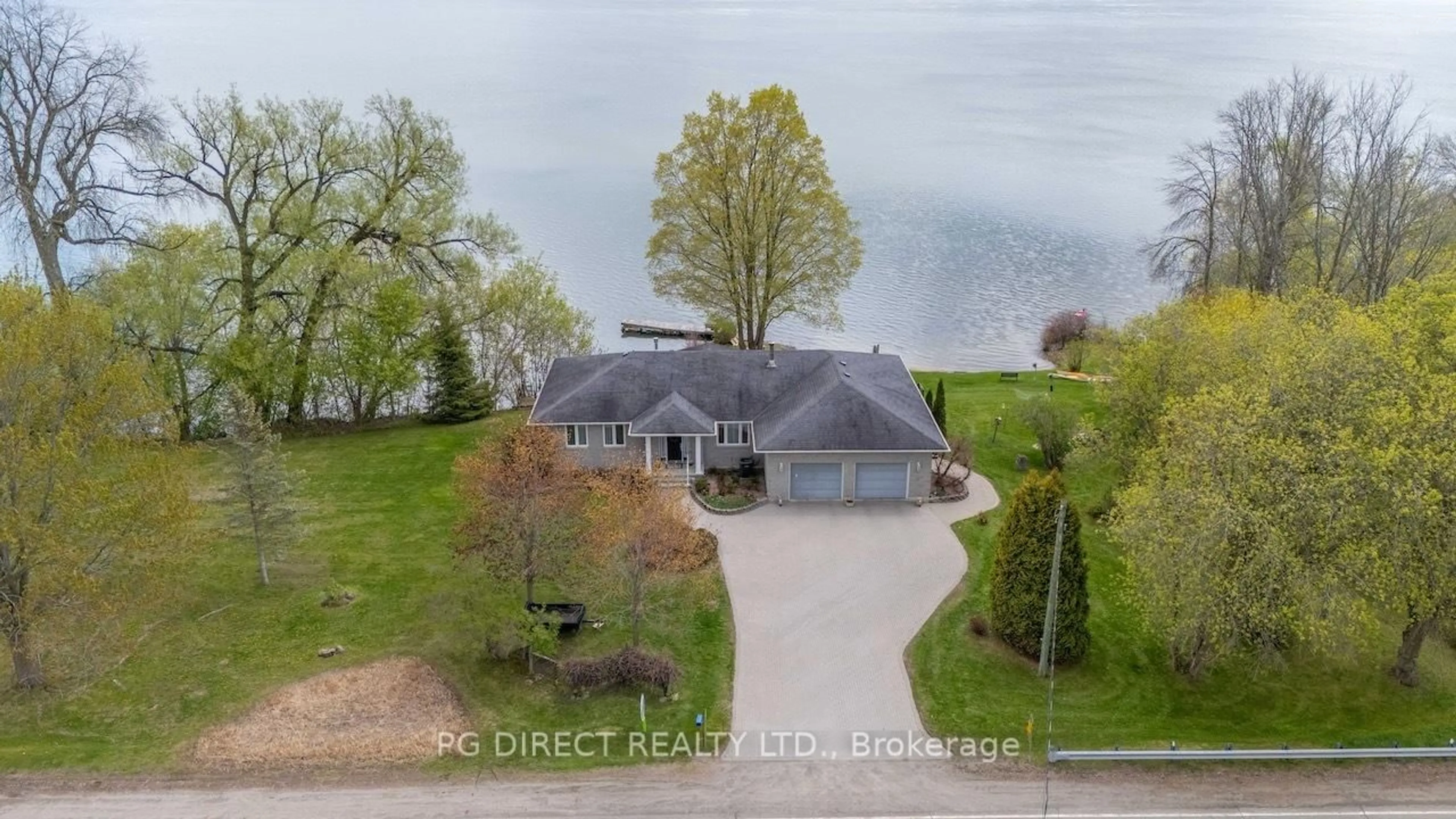A pic from outside/outdoor area/front of a property/back of a property/a pic from drone, water/lake/river/ocean view for 1471 County Rd 2 Rd, Augusta Ontario K0E 1T0