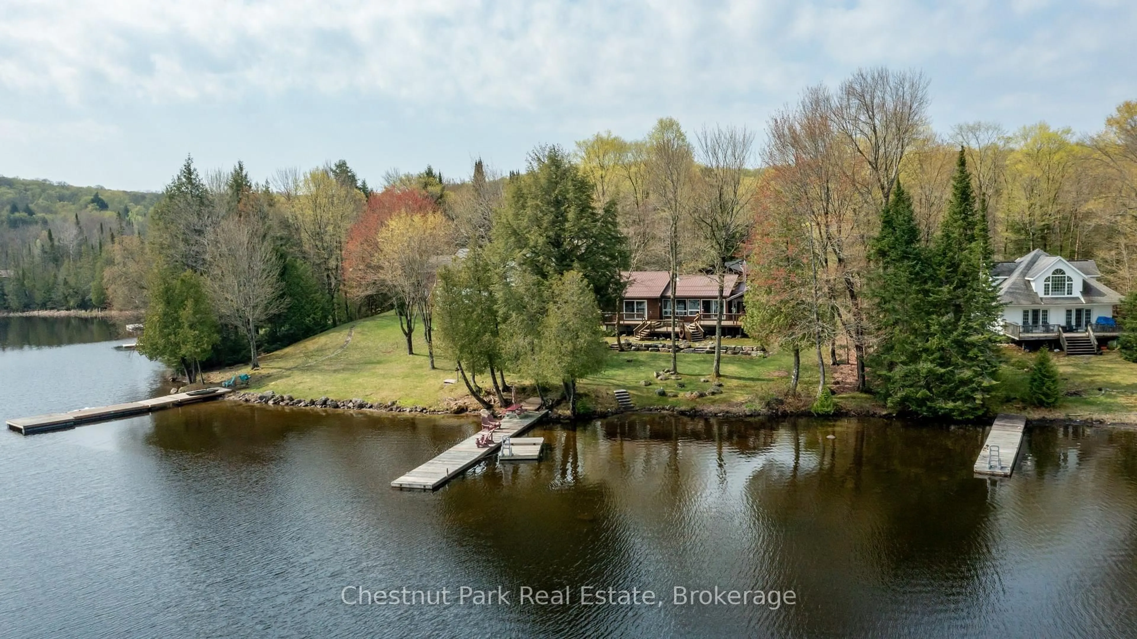 A pic from outside/outdoor area/front of a property/back of a property/a pic from drone, water/lake/river/ocean view for 1408 Bay Lake Rd, Perry Ontario P0A 1J0