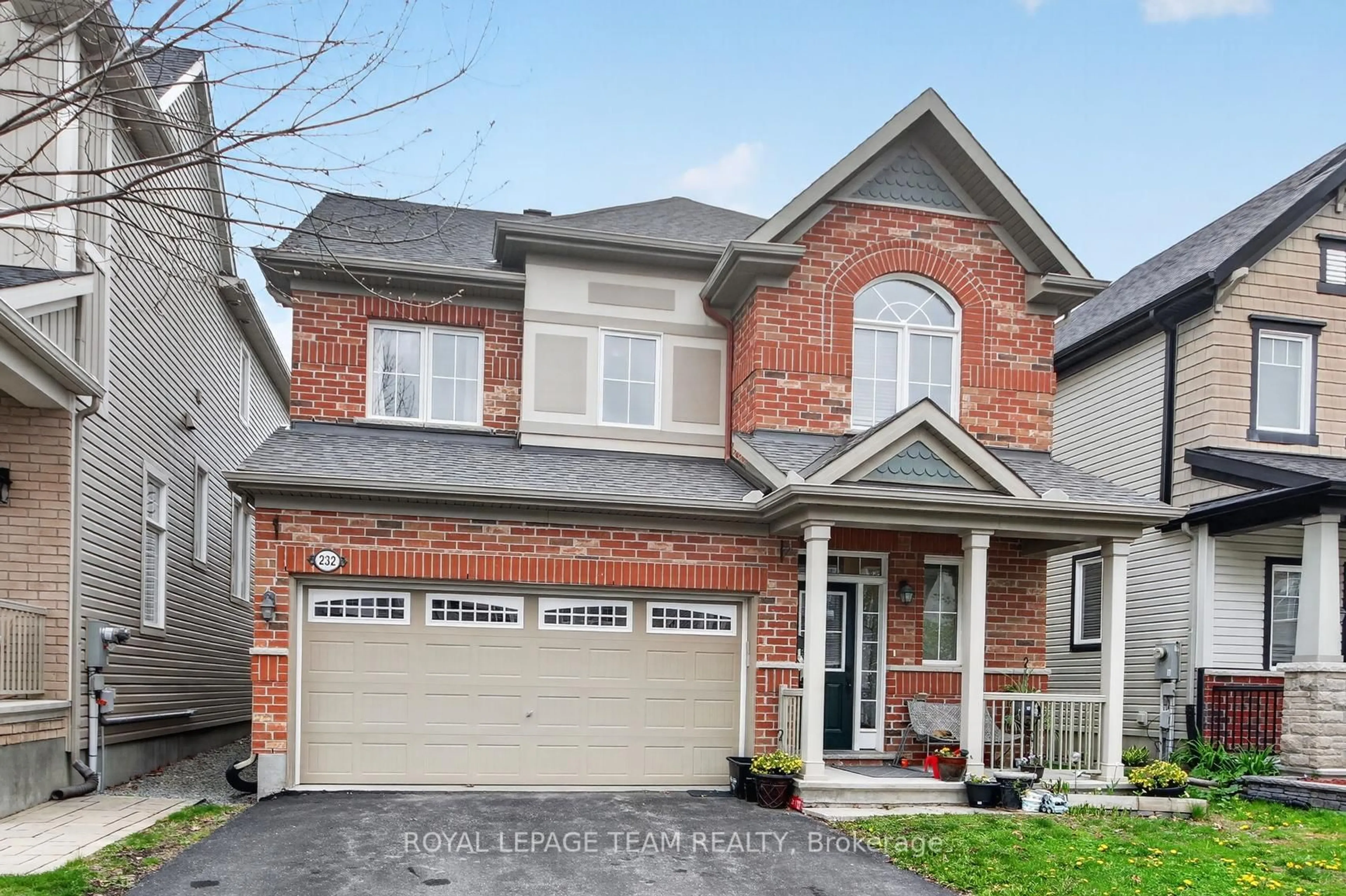 Home with brick exterior material, street for 232 Rivertree St, Ottawa Ontario K2M 0J3