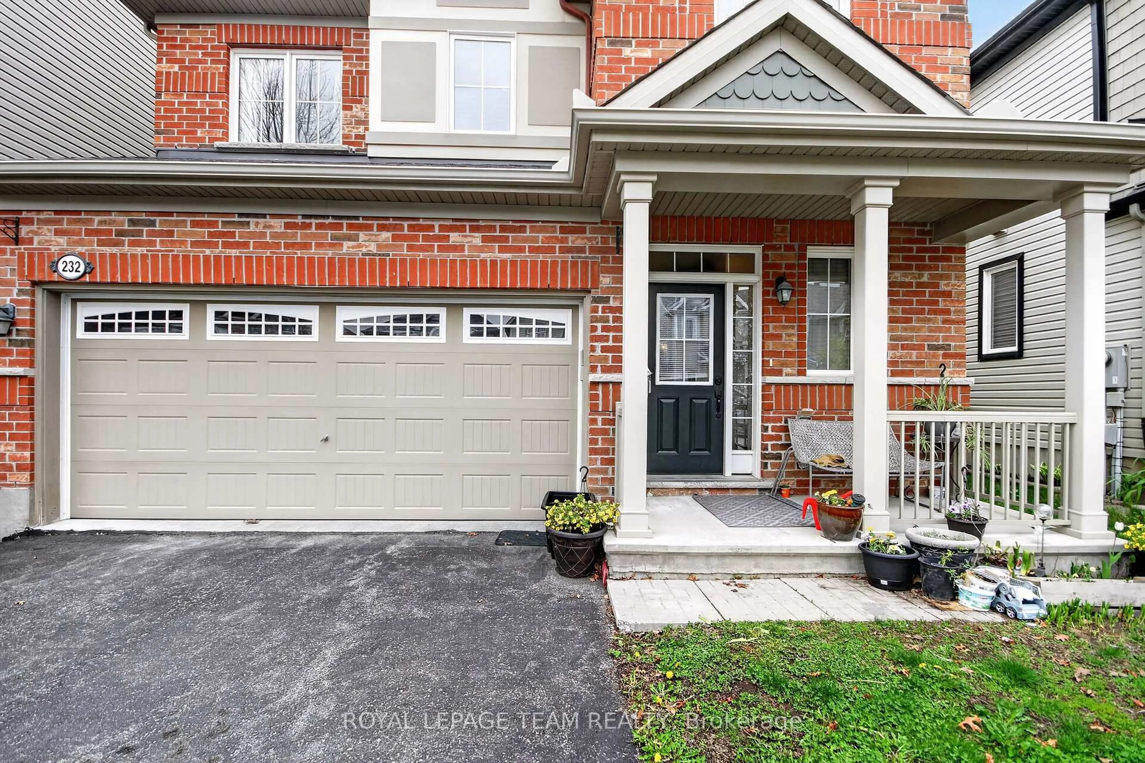 Home with brick exterior material, street for 232 Rivertree St, Ottawa Ontario K2M 0J3