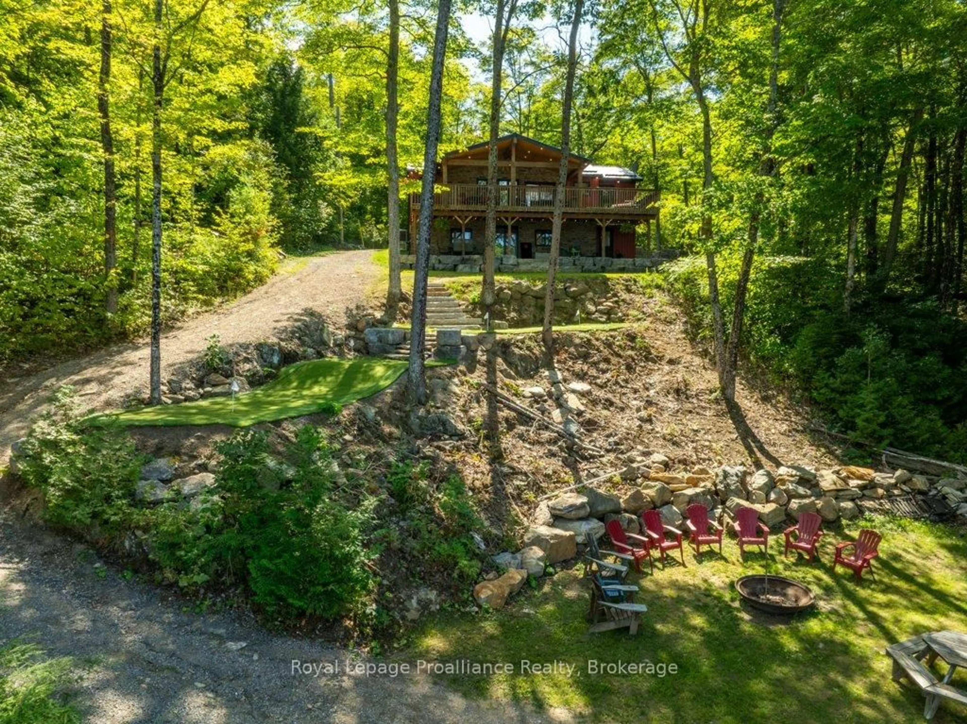 A pic from outside/outdoor area/front of a property/back of a property/a pic from drone, water/lake/river/ocean view for 1202 Rocky Lane Lane, Cloyne Ontario K0H 1K0
