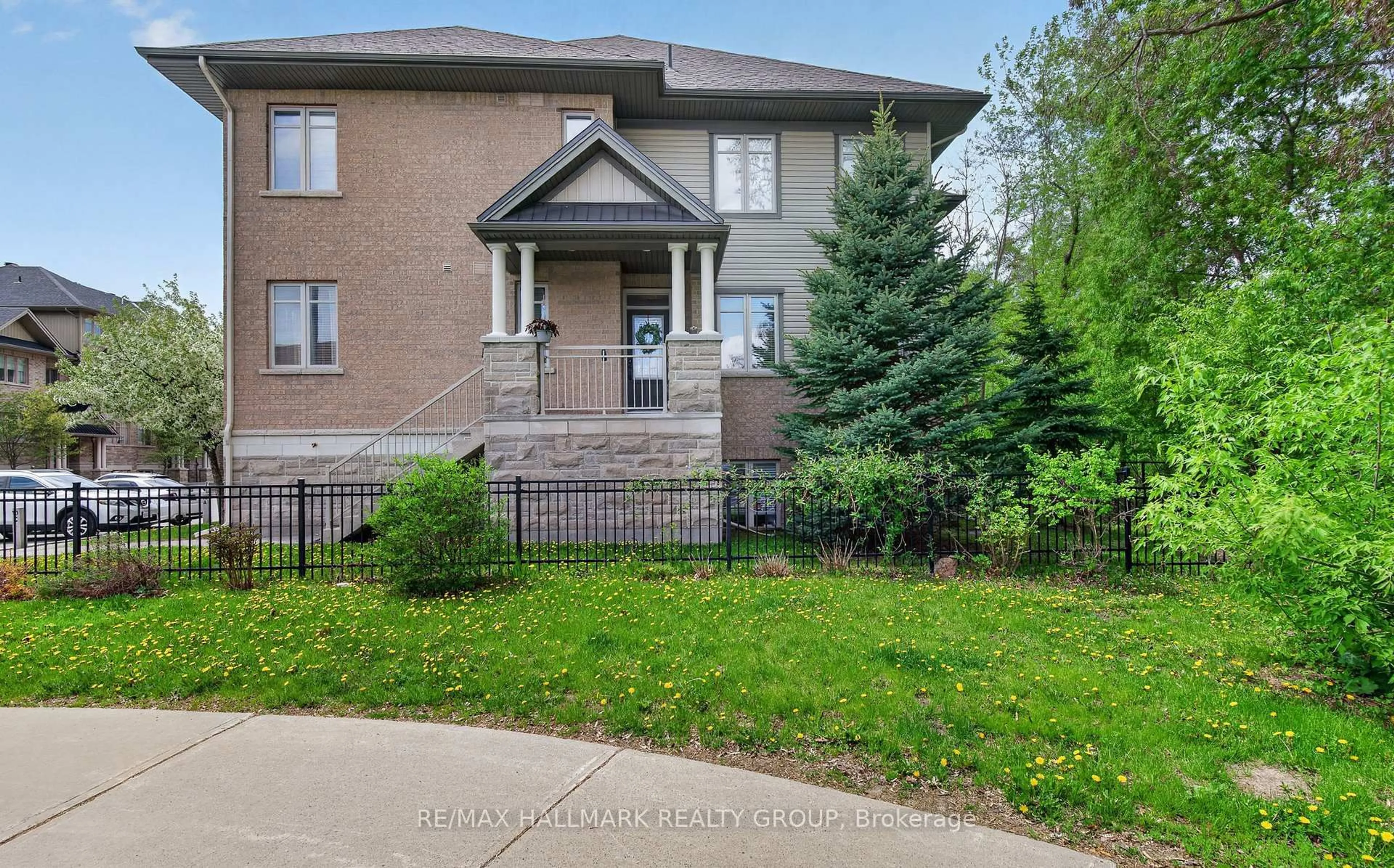 Home with brick exterior material, street for 15 Tadley Private #14, Ottawa Ontario K2J 2T3
