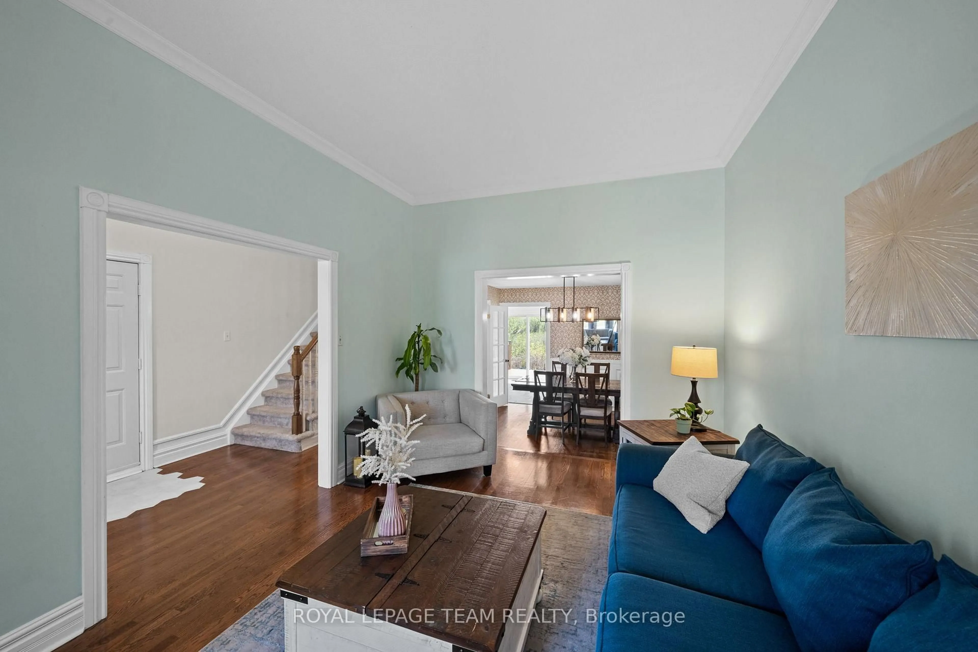 Living room with furniture, wood/laminate floor for 14 Greer St, Stittsville Ontario K2S 1H8