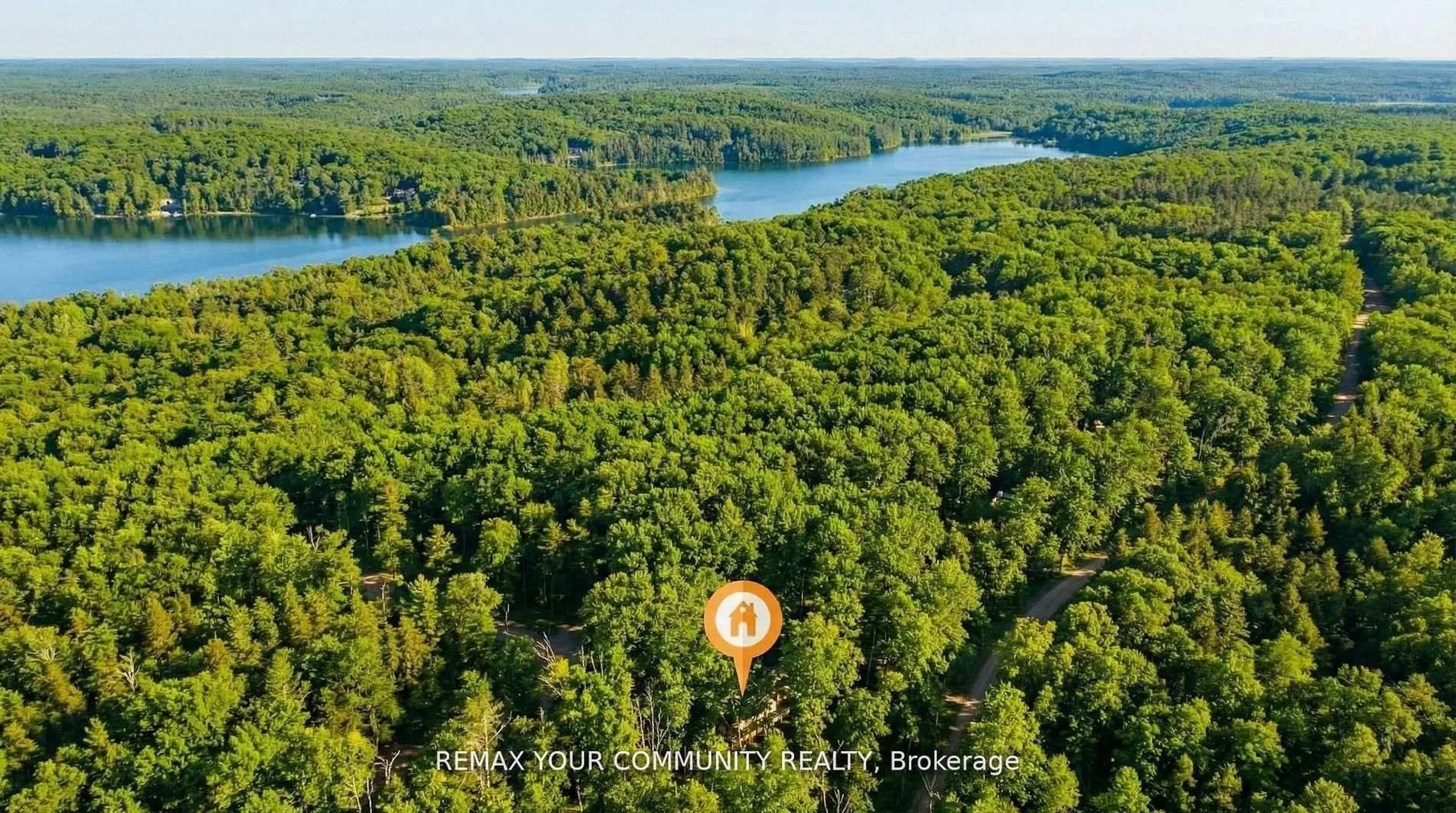 A pic from outside/outdoor area/front of a property/back of a property/a pic from drone, water/lake/river/ocean view for 1534 Salerno Lake Rd, Highlands East Ontario K0M 1X0