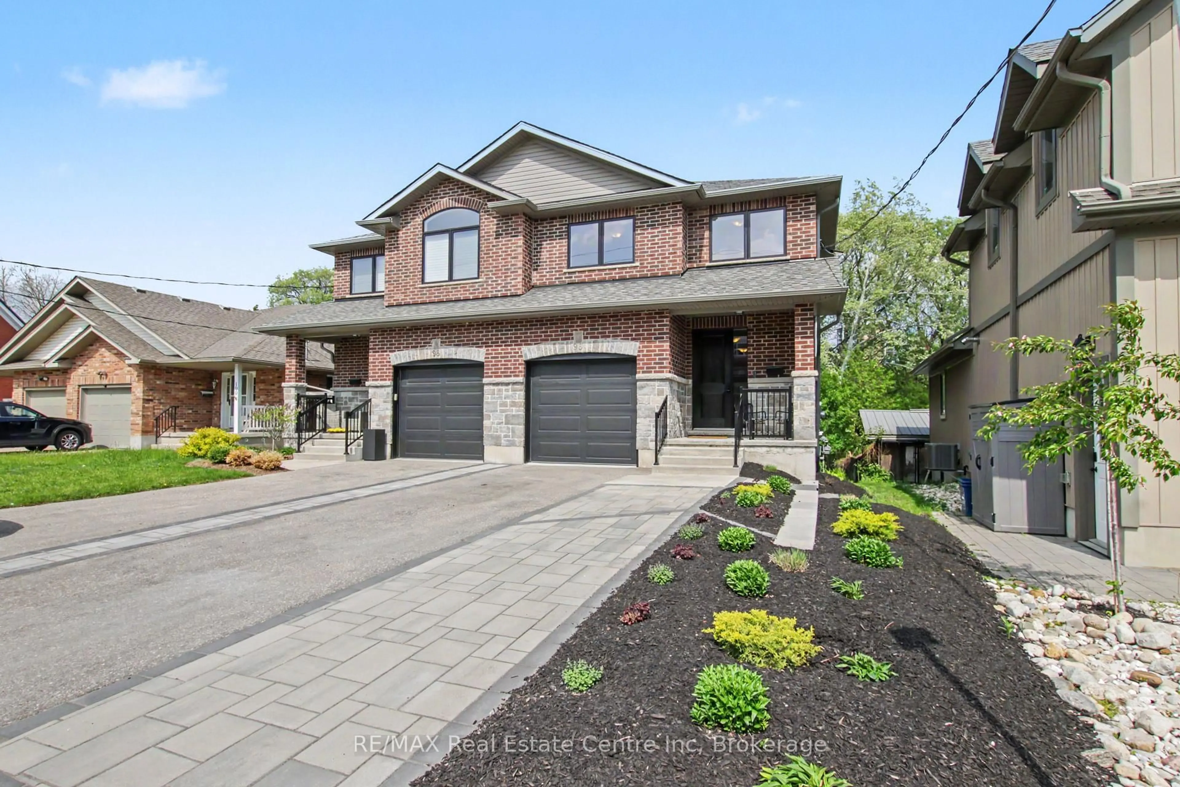 Home with brick exterior material, street for 96 Strange St, Kitchener Ontario N2G 1R3