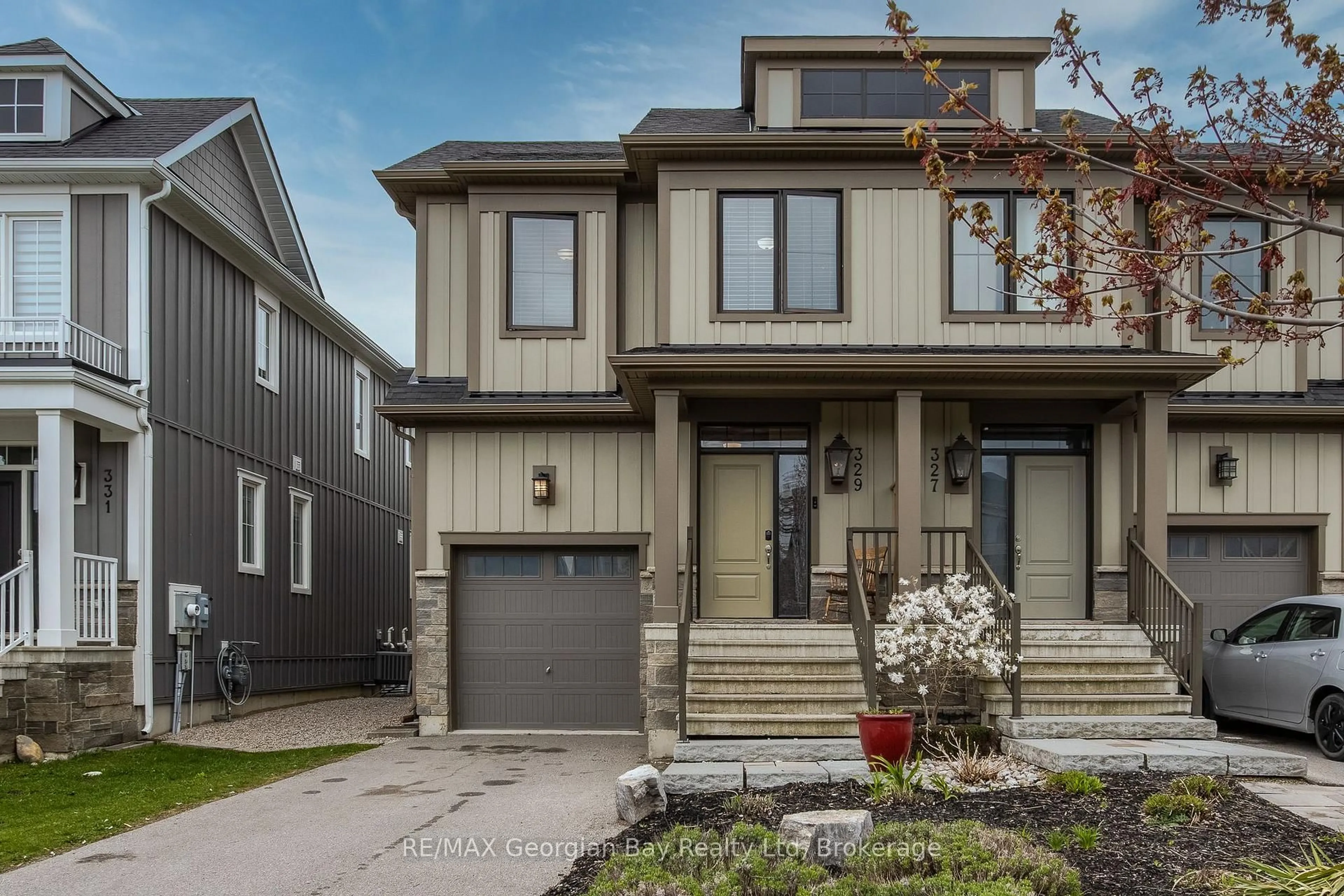 Home with brick exterior material, street for 329 Yellow Birch Cres, Blue Mountains Ontario L9Y 0Y5