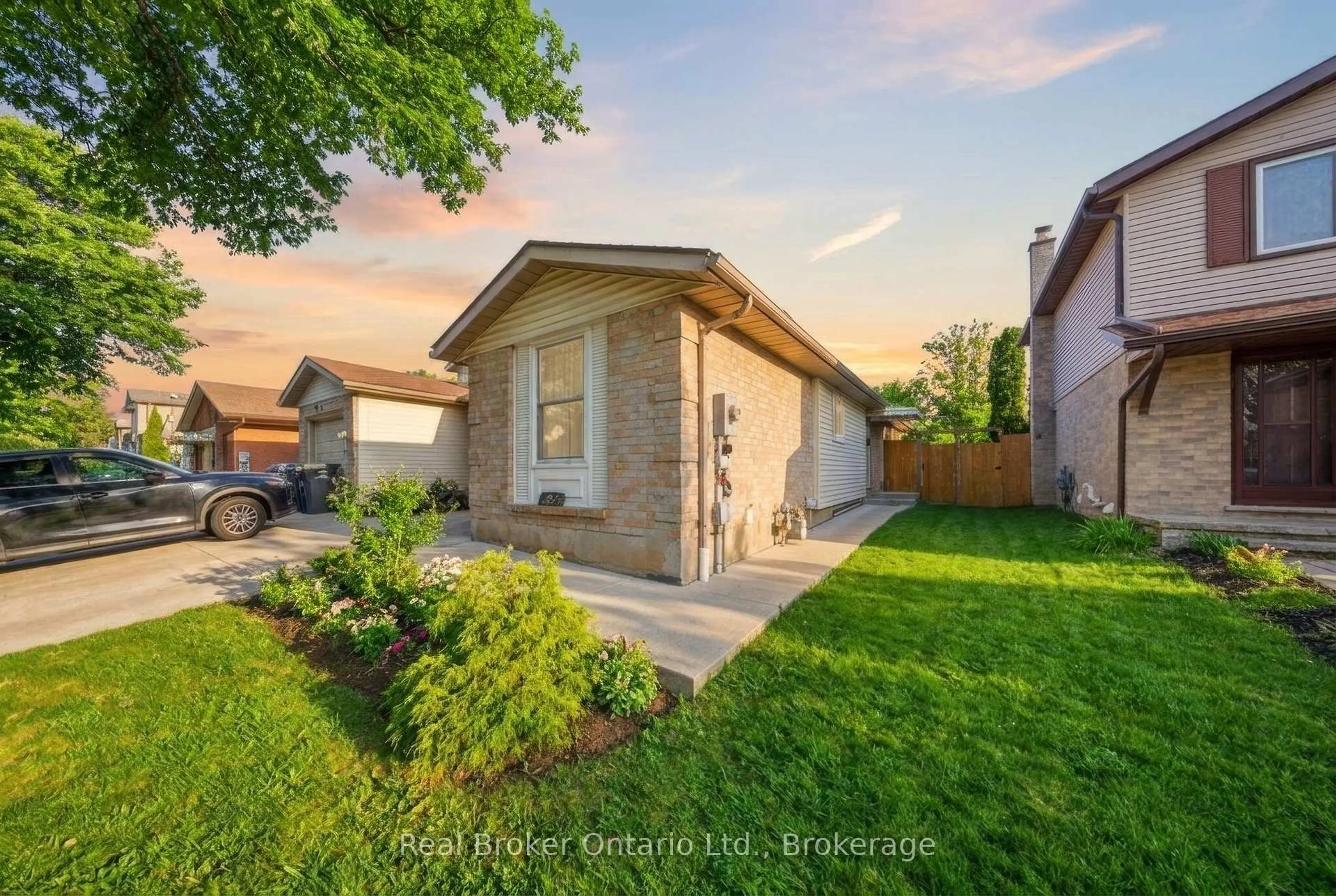 Home with brick exterior material, street for 58 Leacock Ave, Guelph Ontario N1E 6R1