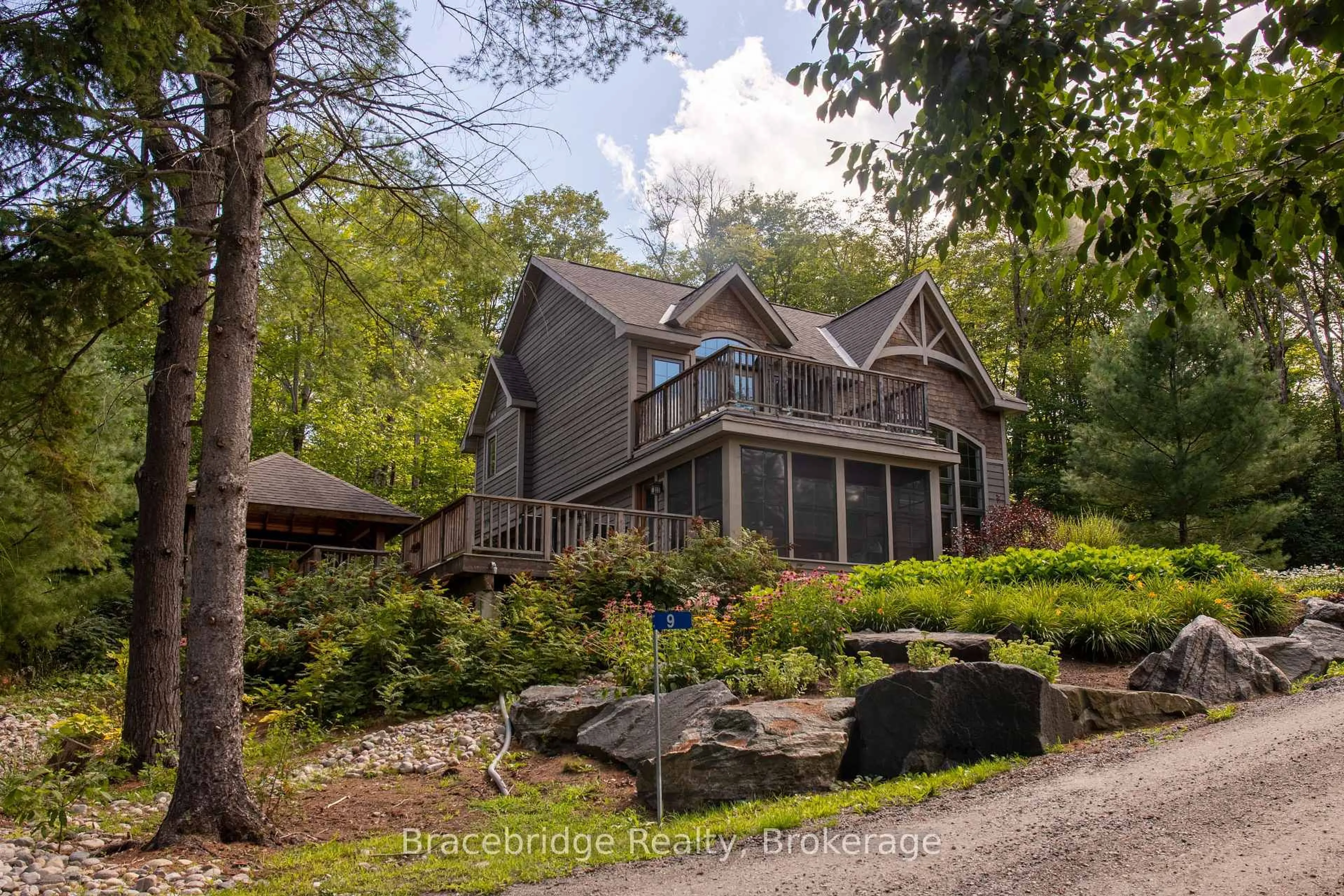 A pic from outside/outdoor area/front of a property/back of a property/a pic from drone, unknown for 3876 Muskoka Rd 118 Highway #Sandfield 9 W9, Muskoka Lakes Ontario P0B 1J0