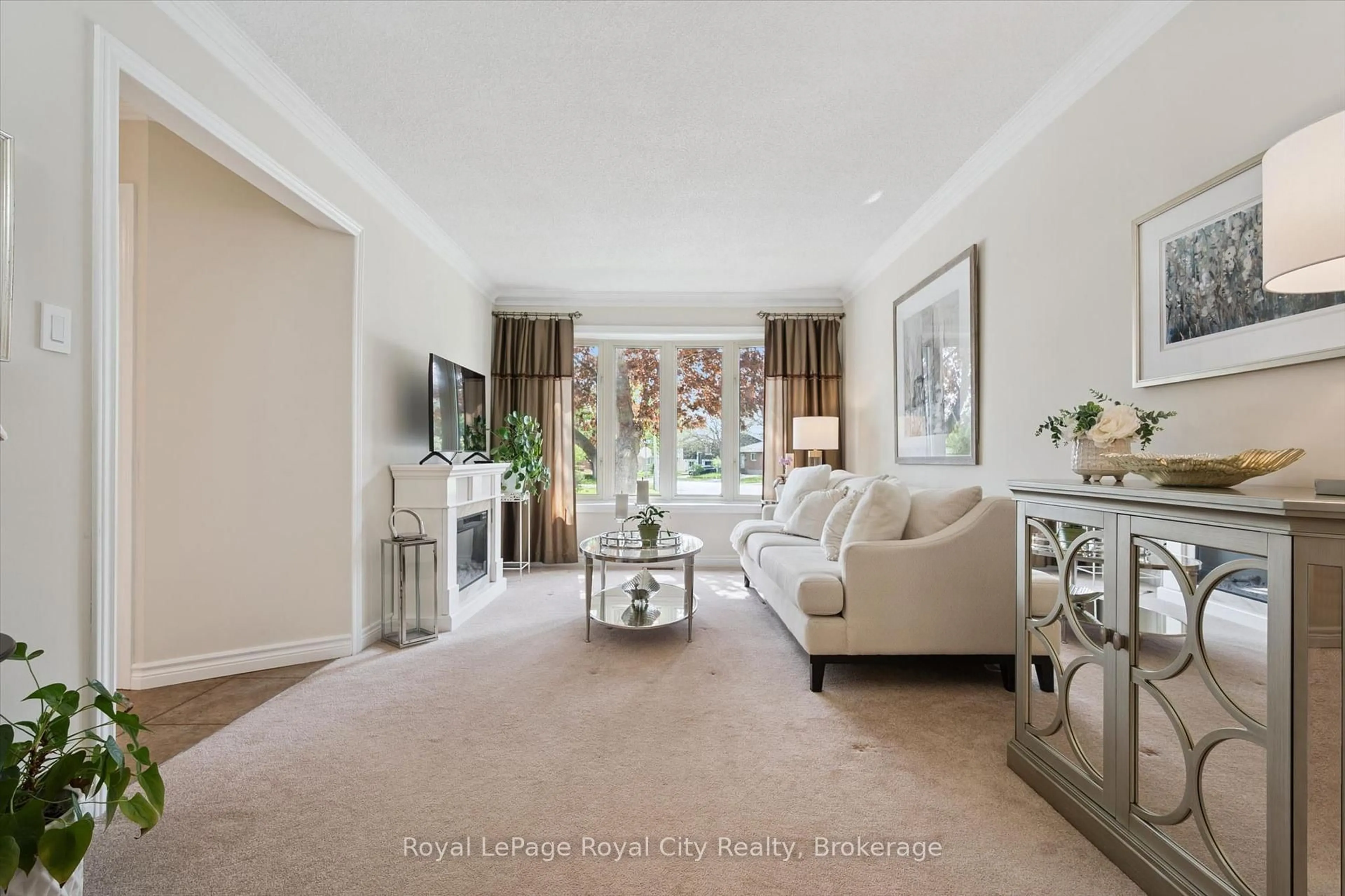 Living room with furniture, carpet floor for 269 Auden Rd, Guelph Ontario N1E 6N5