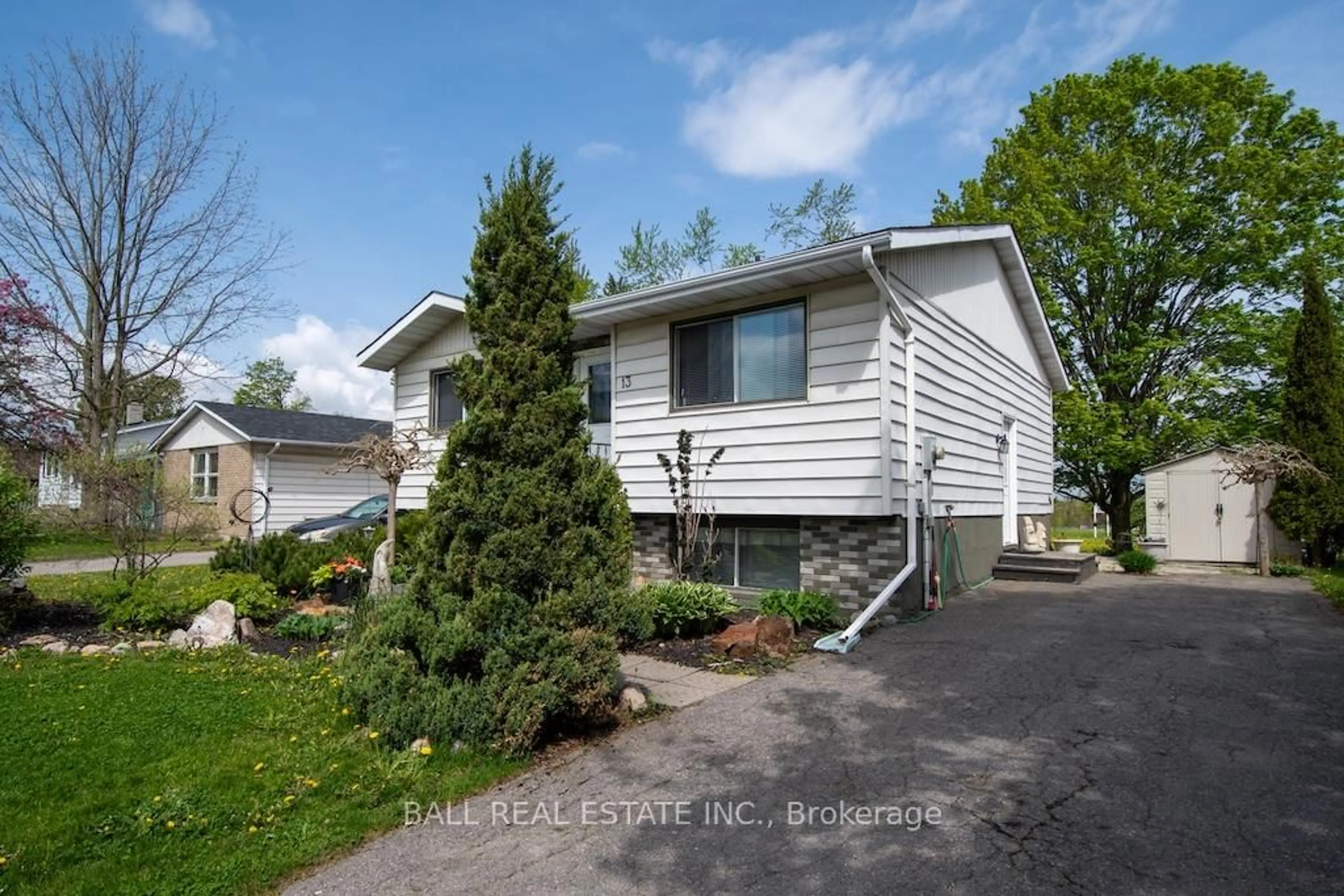 Home with vinyl exterior material, street for 13 Coyle Cres, Selwyn Ontario K0L 2H0