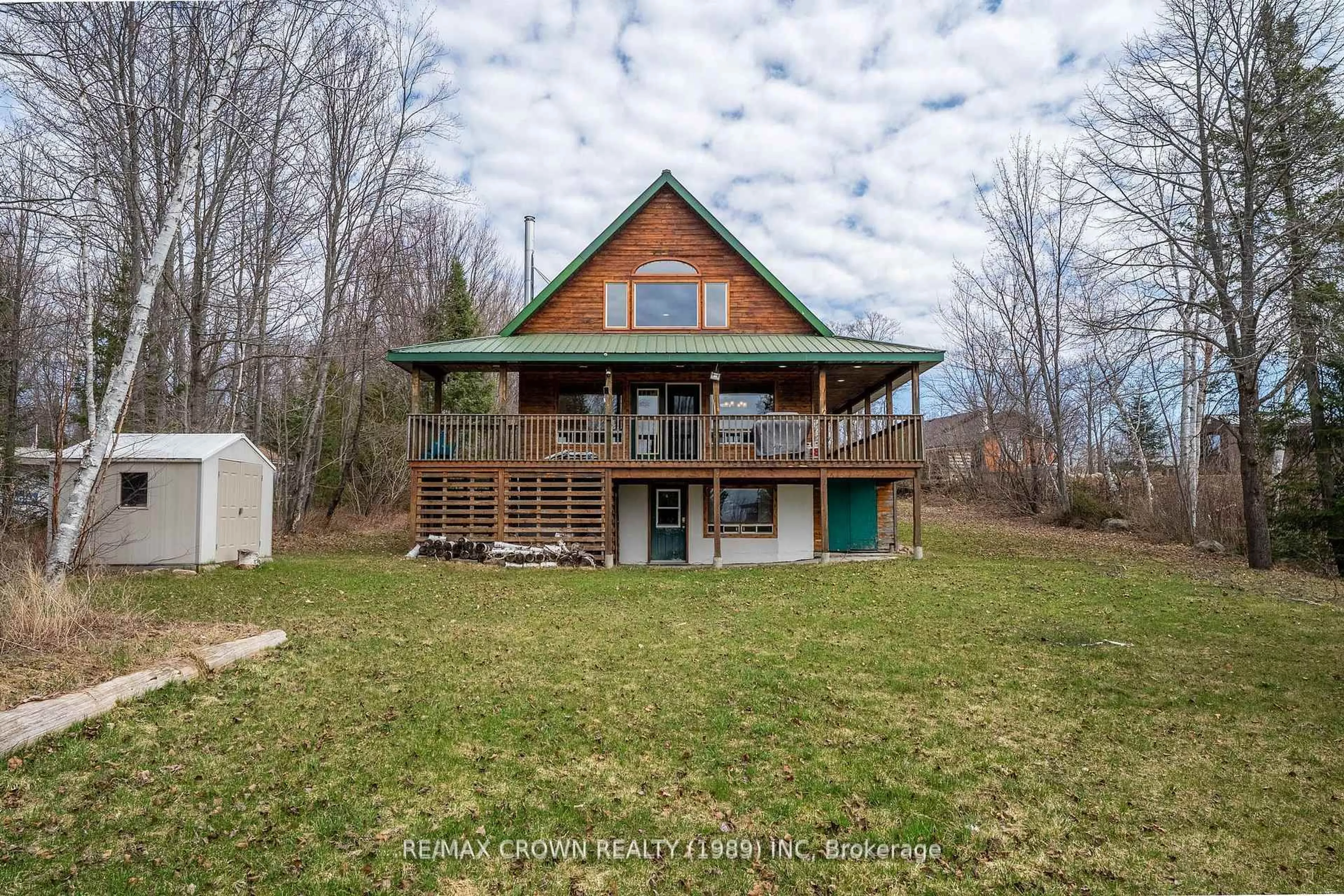 A pic from outside/outdoor area/front of a property/back of a property/a pic from drone, water/lake/river/ocean view for 102 North Star Rd, Bonfield Ontario P0H 1E0