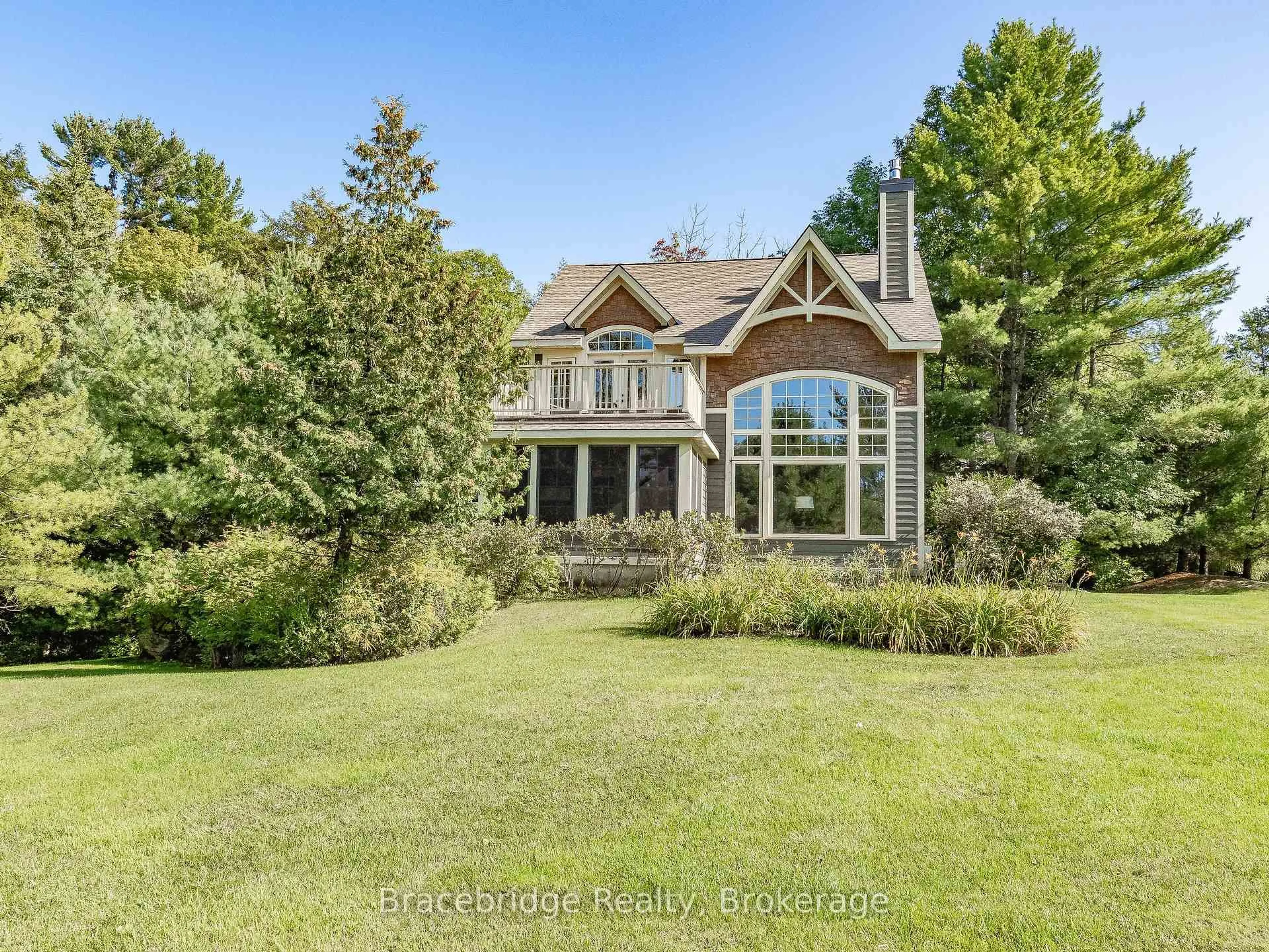 A pic from outside/outdoor area/front of a property/back of a property/a pic from drone, water/lake/river/ocean view for 3876 Muskoka Rd 118 Highway #Sandfield 8 W4, Muskoka Lakes Ontario P0B 1J0